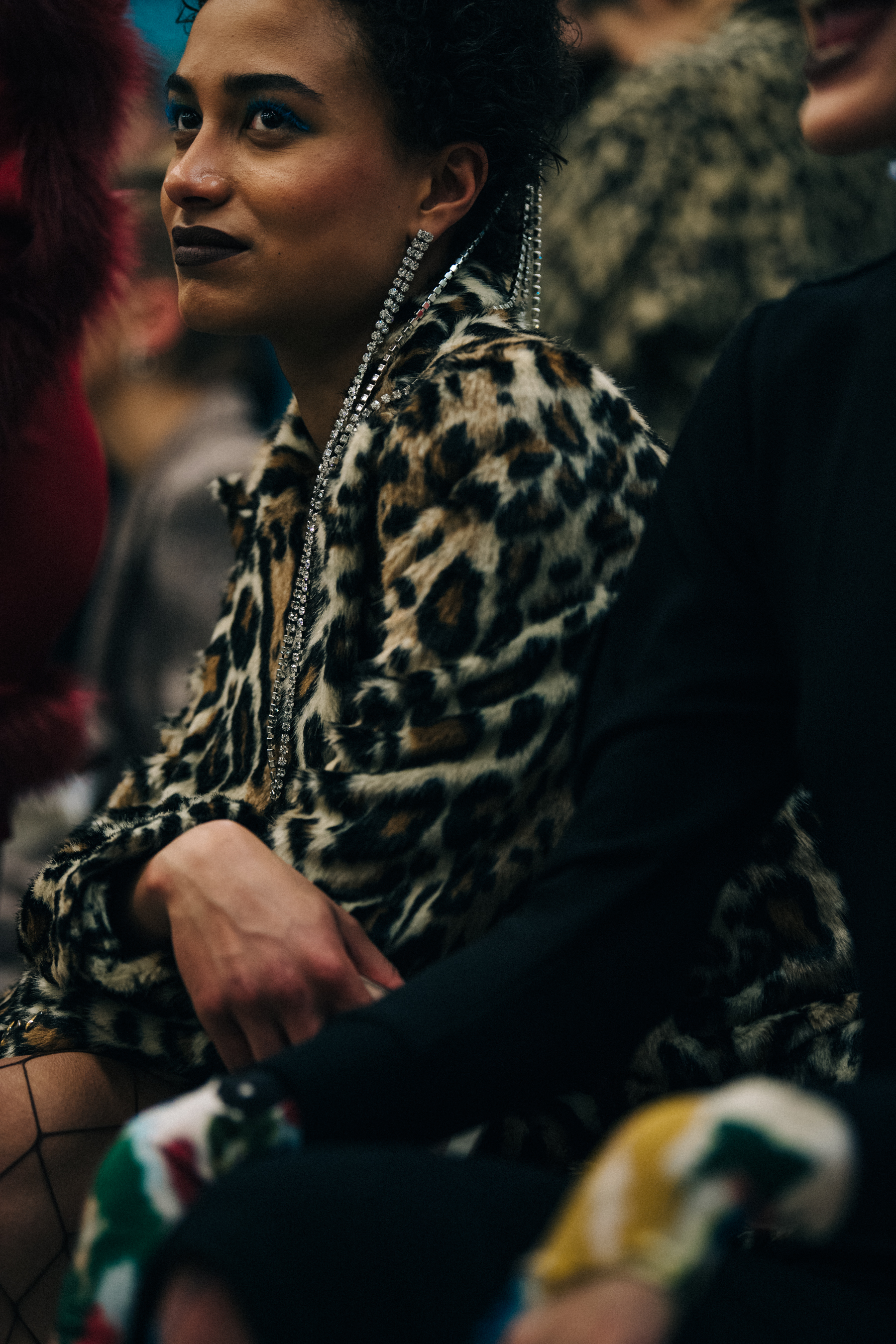 Model wearing animal print outfit backstage