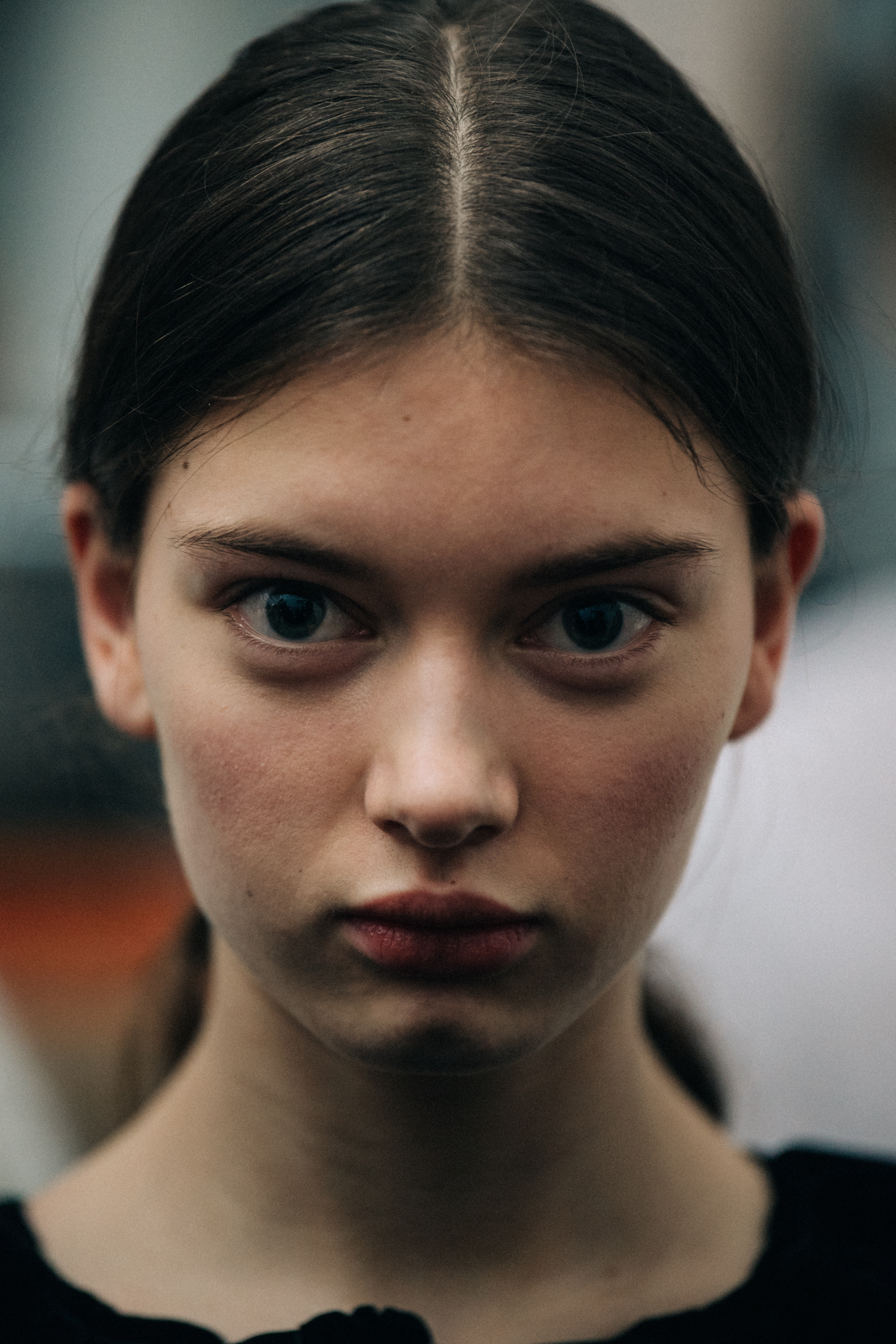 Portrait of model with dark tied hair