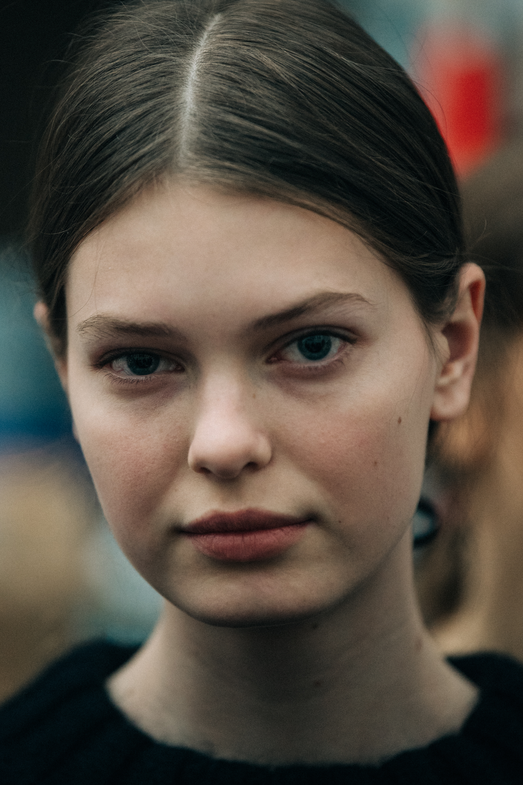 Portrait of model with blue eyes at Cecilie Bahnsen