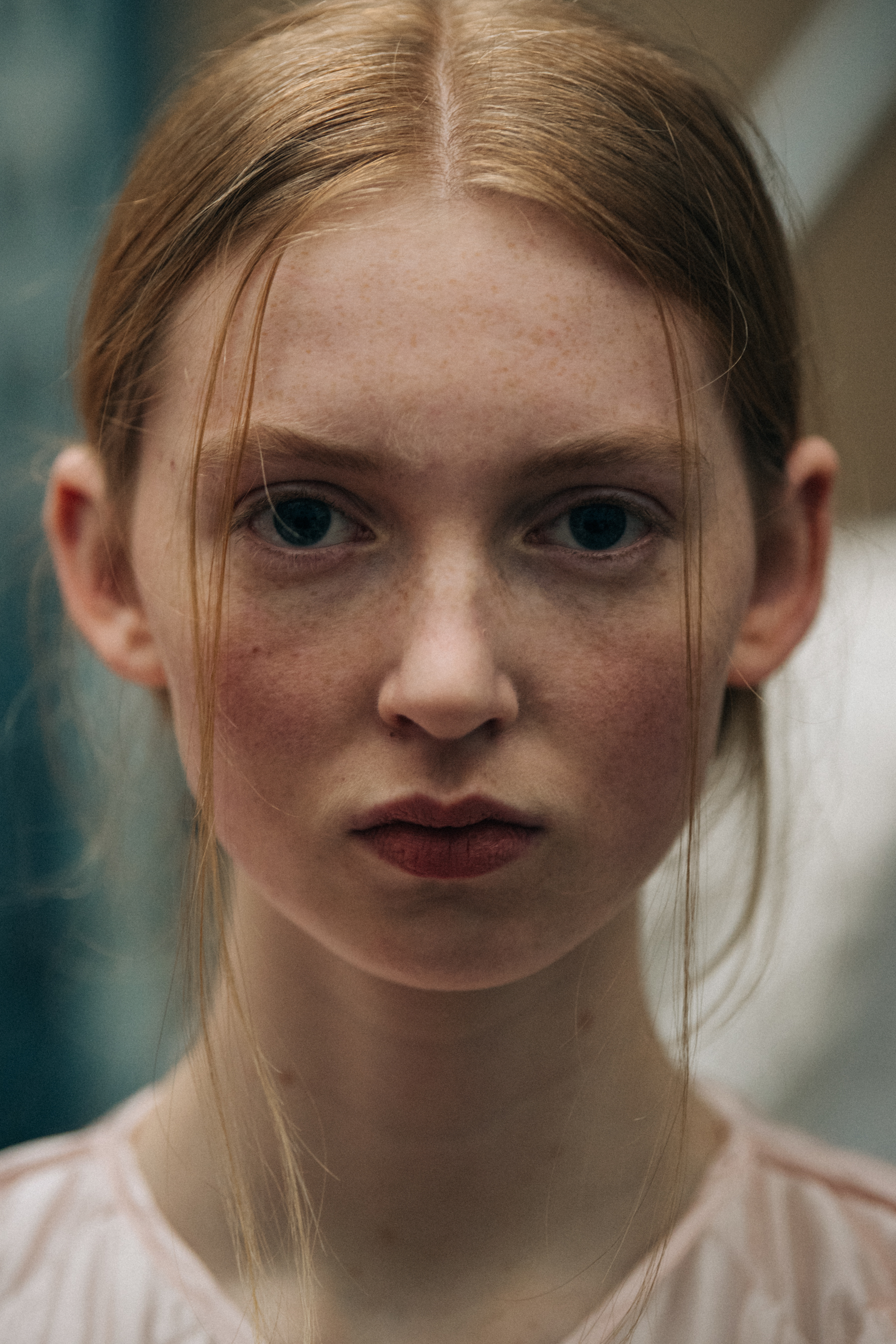 Portrait of model with red hair and pale skin