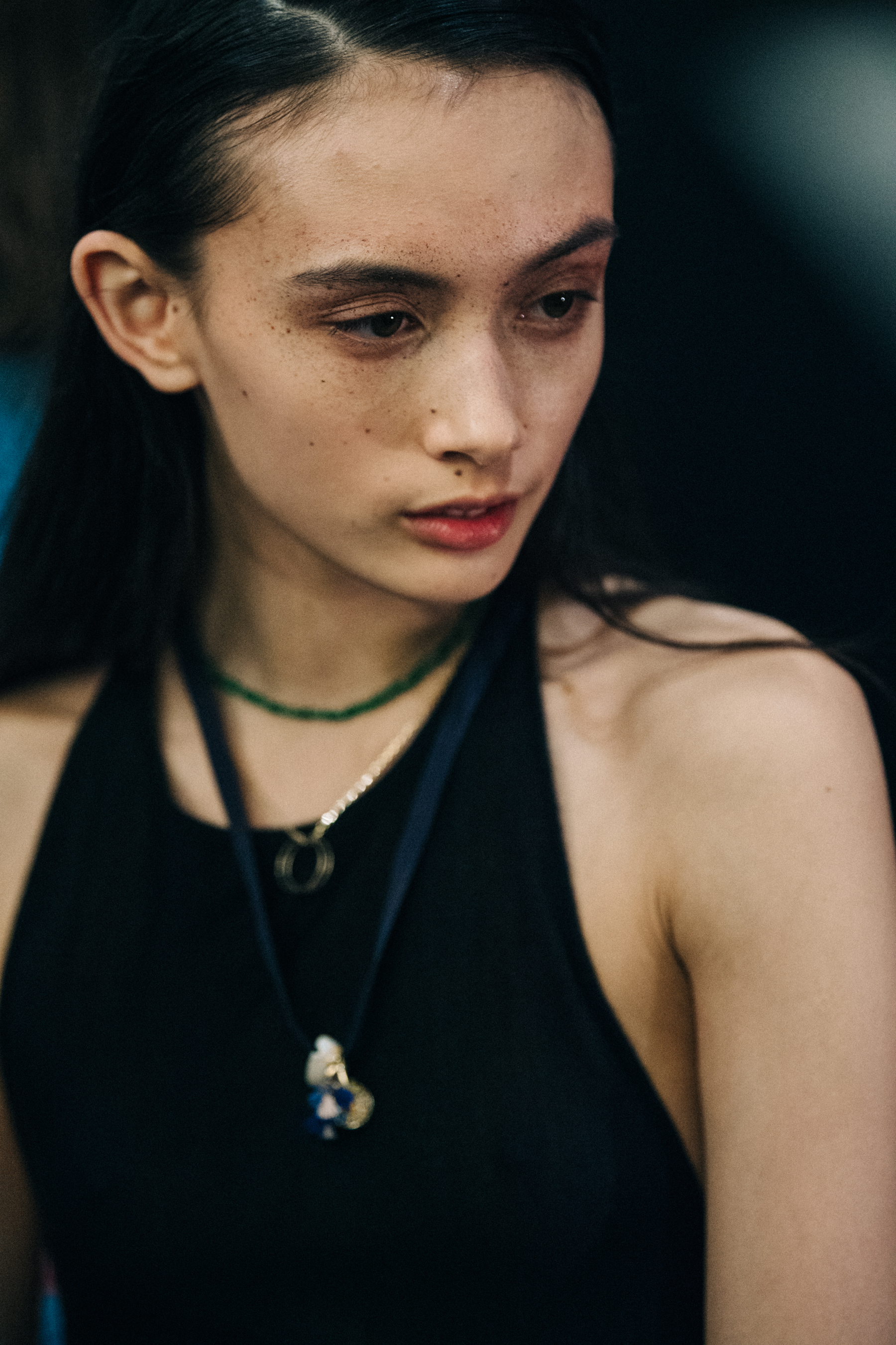 Model wearing black backstage at Esteban Cortazar