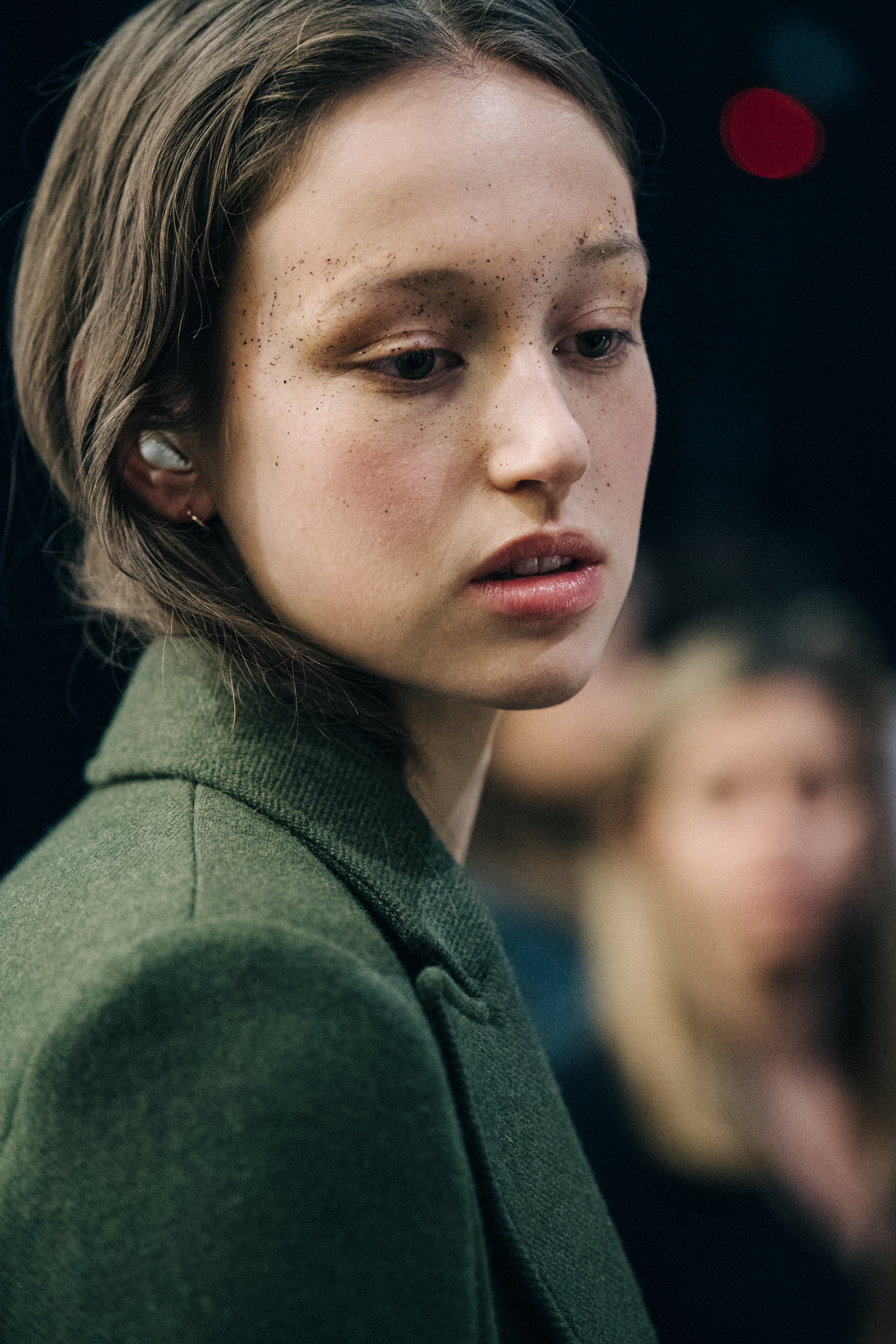 Model wearing green backstage at Esteban Cortazar