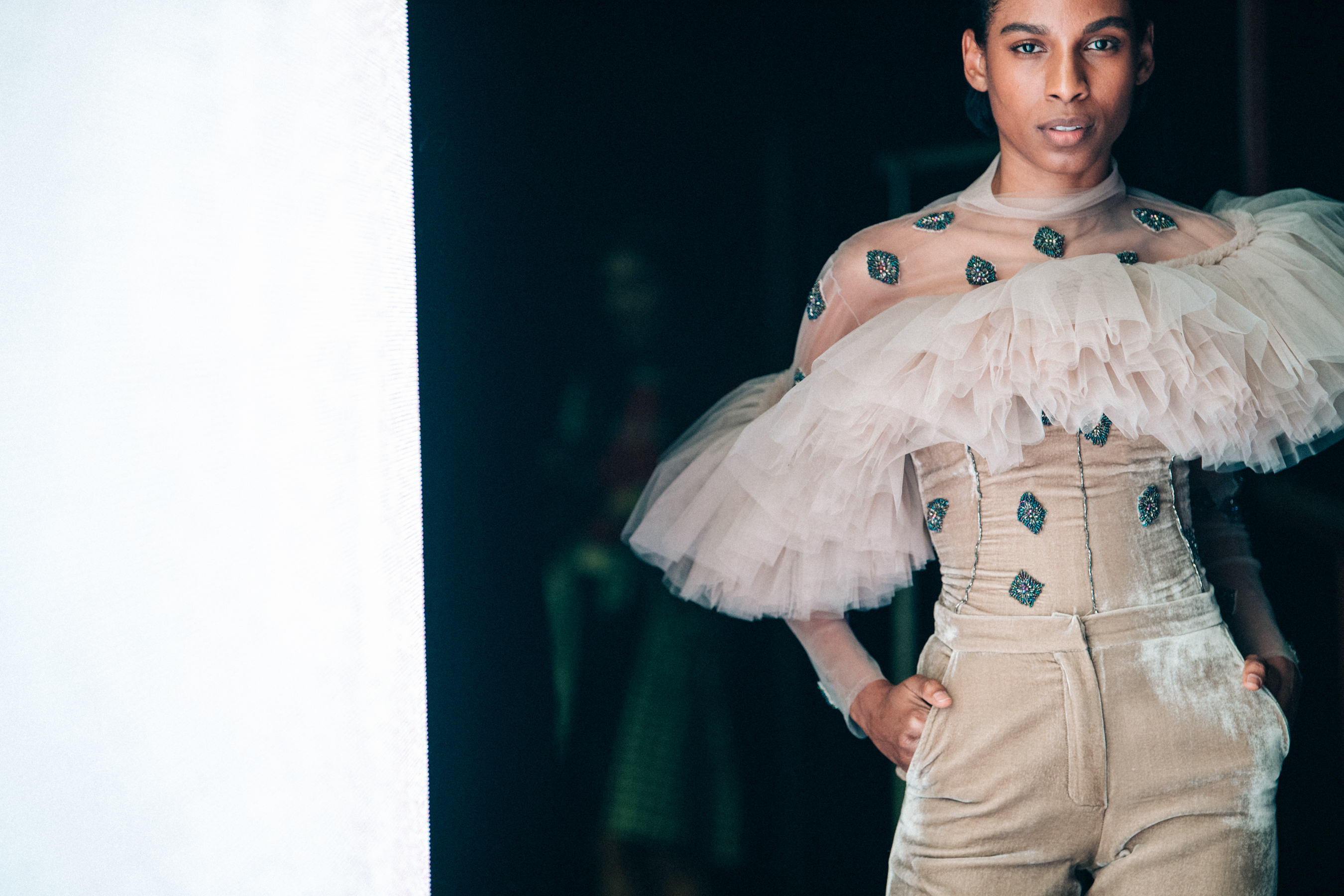 Model wearing white outfit at Sudi Etuz