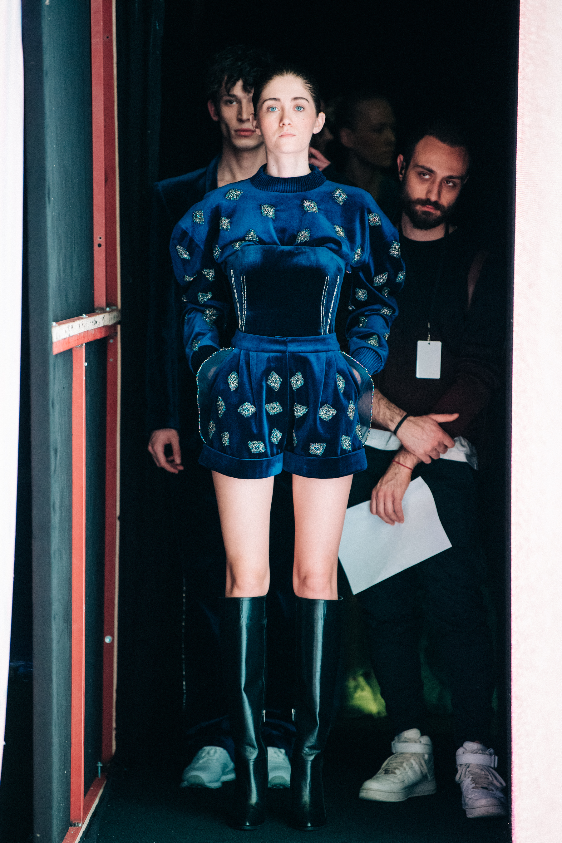 Model wearing blue outfit at Sudi Etuz