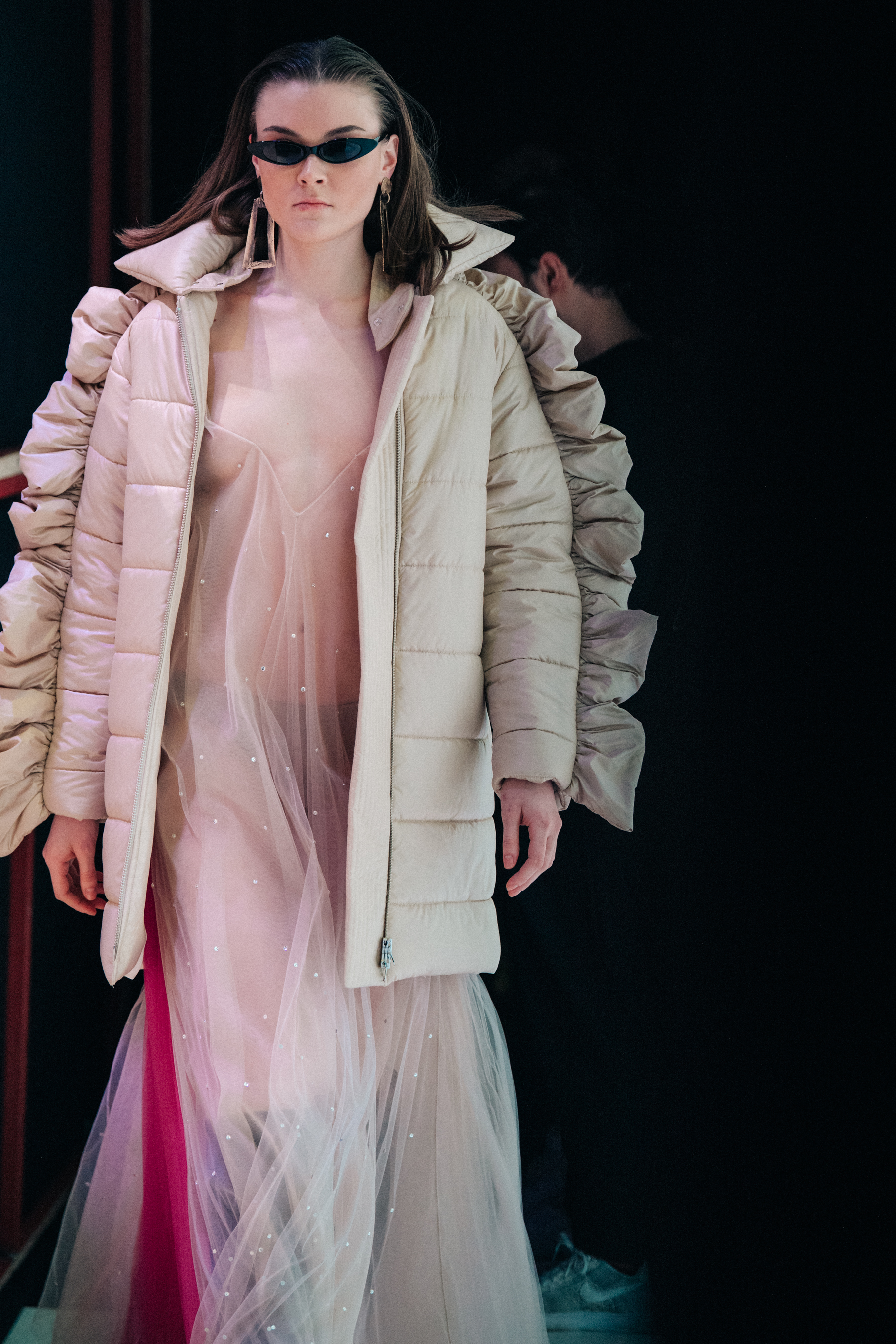 Model wearing ruffled outfit at Sudi Etuz