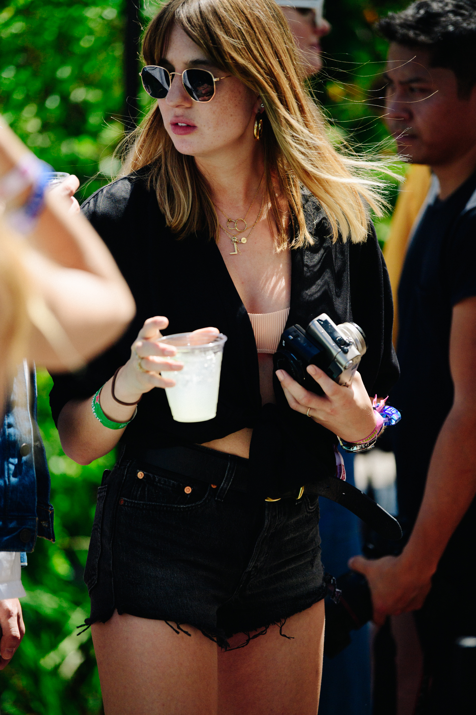 Woman wearing black denim shorts