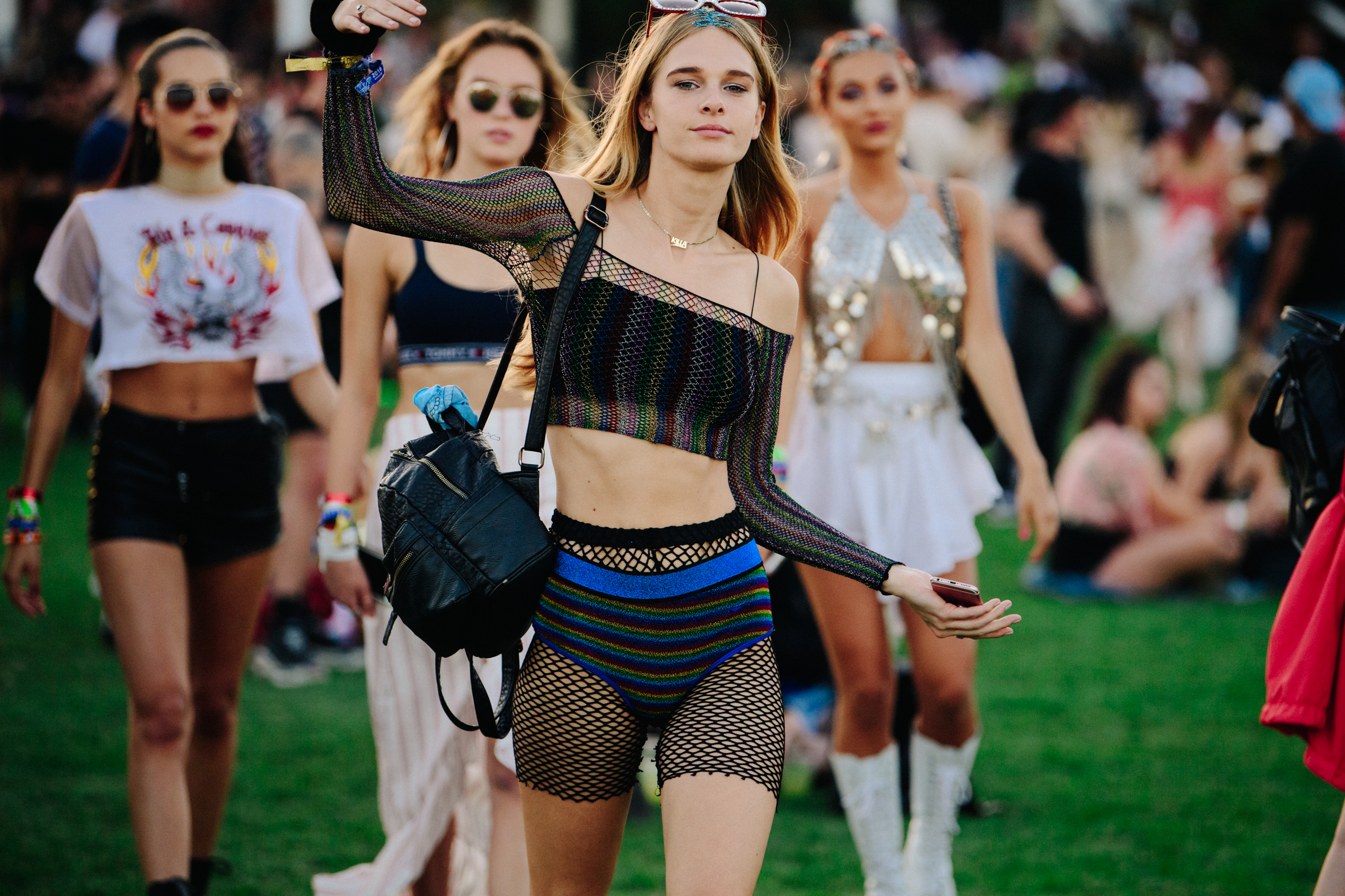 Blonde girl wearing colourful outfit