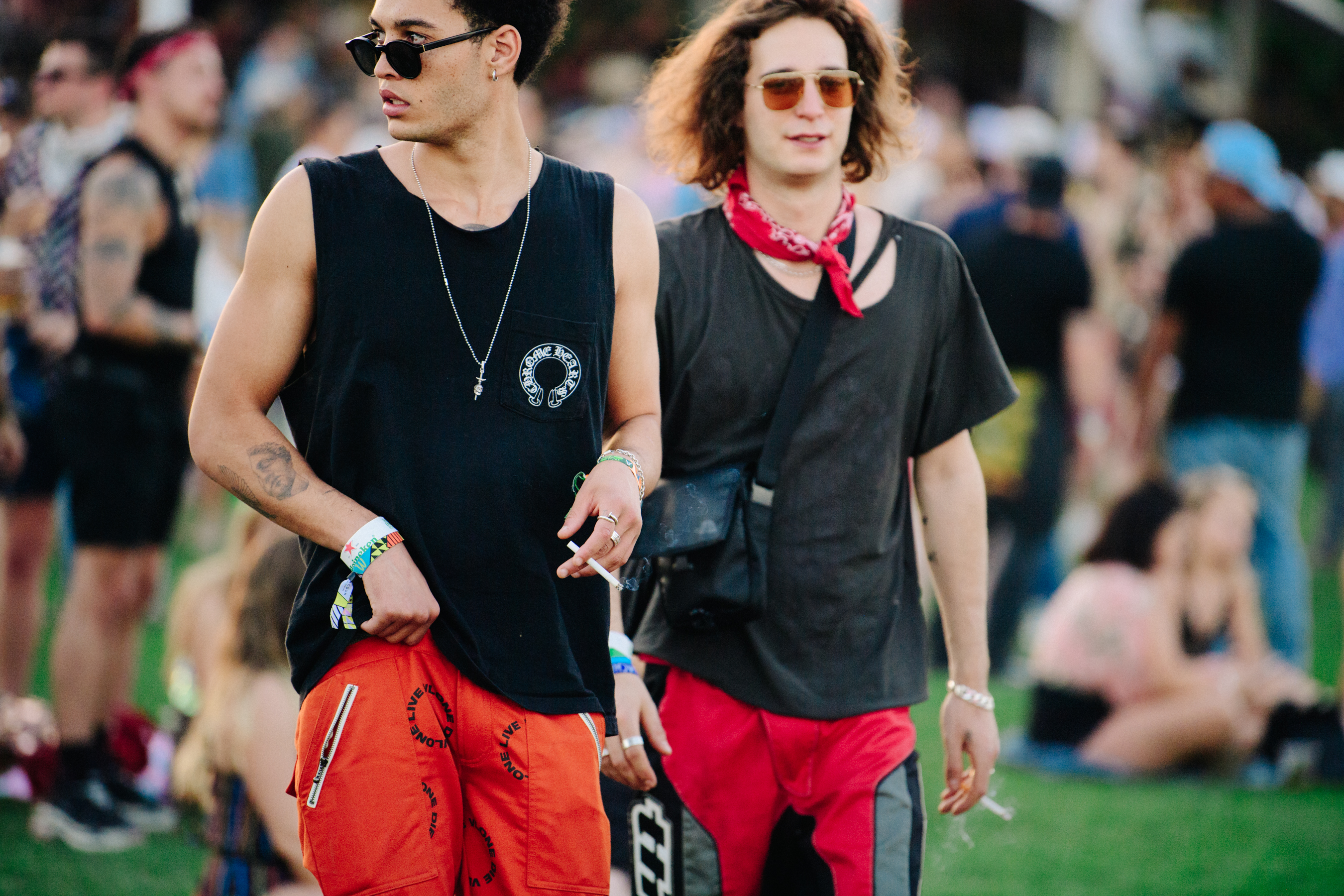 Two men wearing red pants