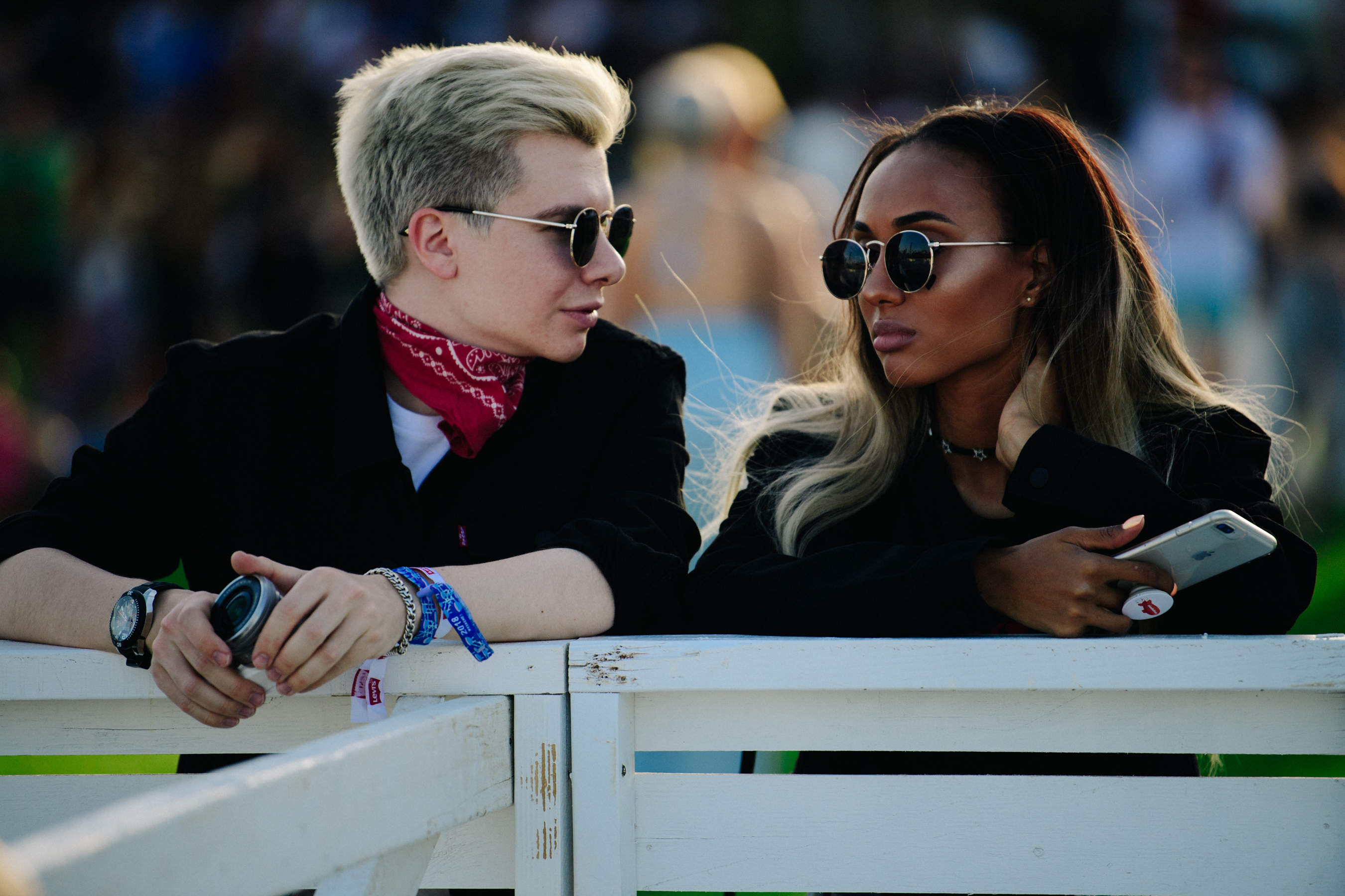 Couple wearing round sunglasses