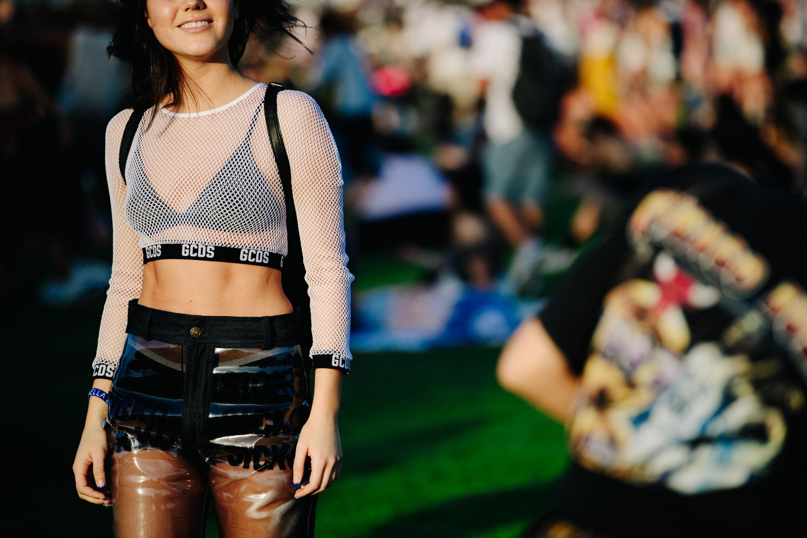 Woman wearing white net top