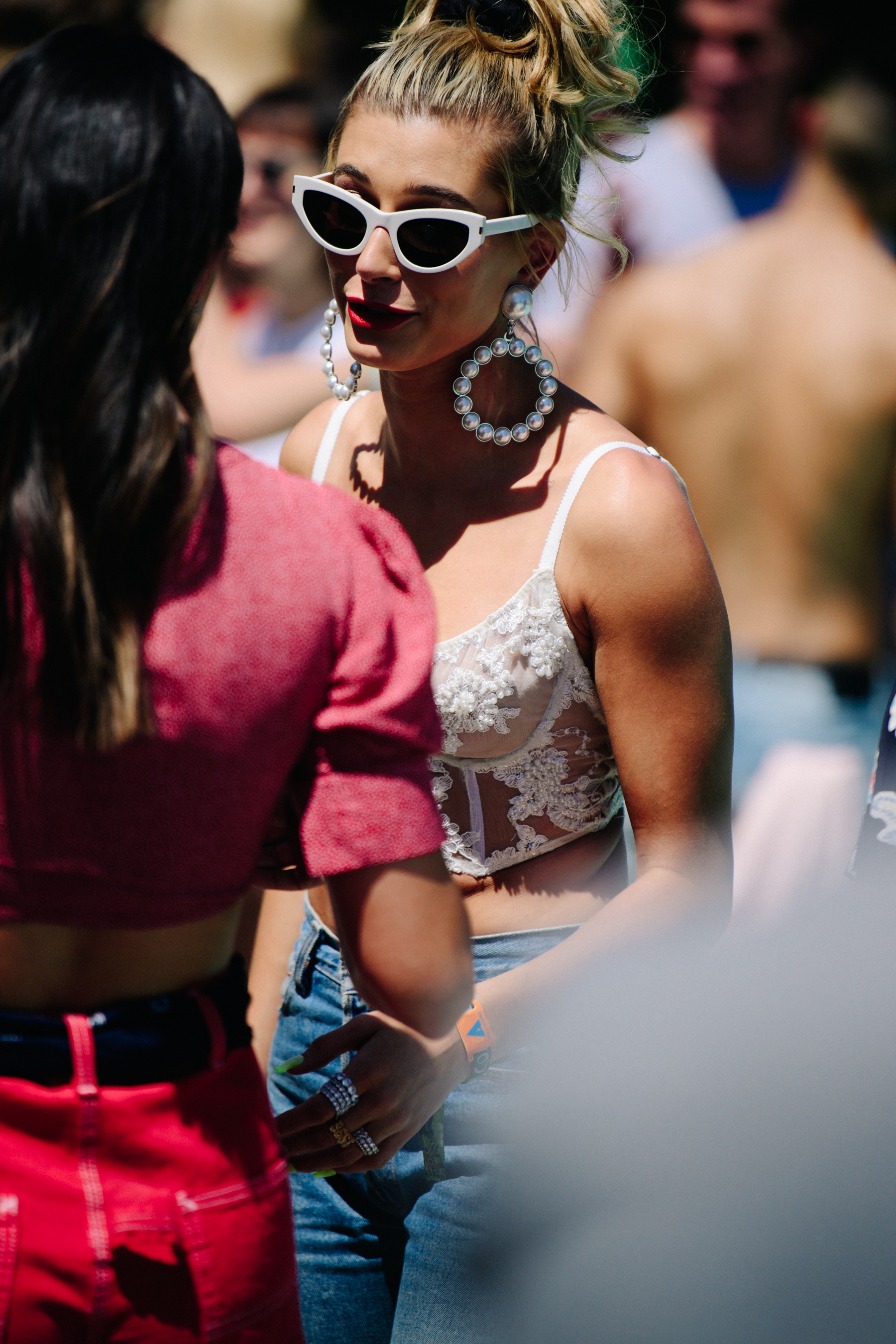 American model wearing white lace