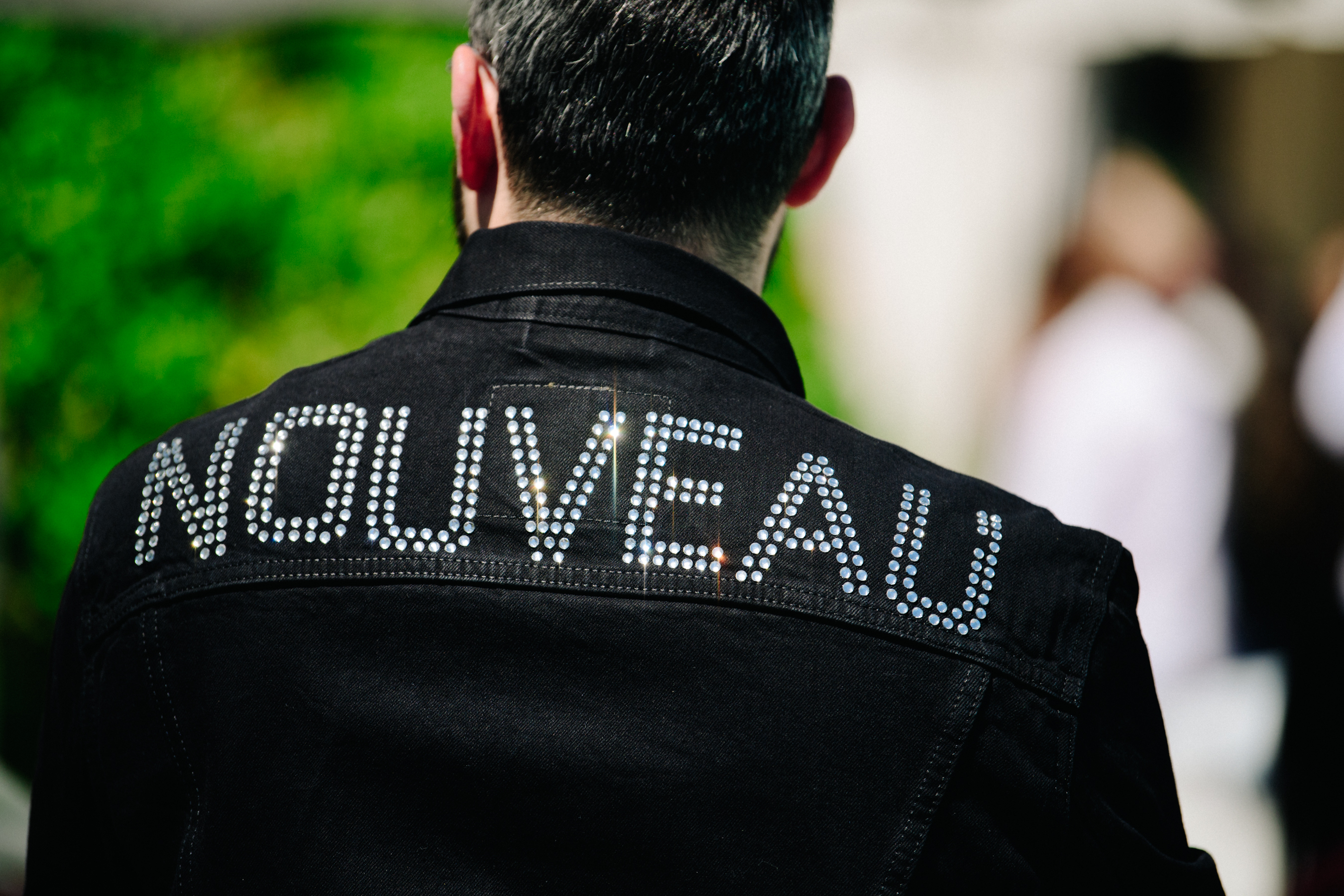 Man wearing black denim jacket