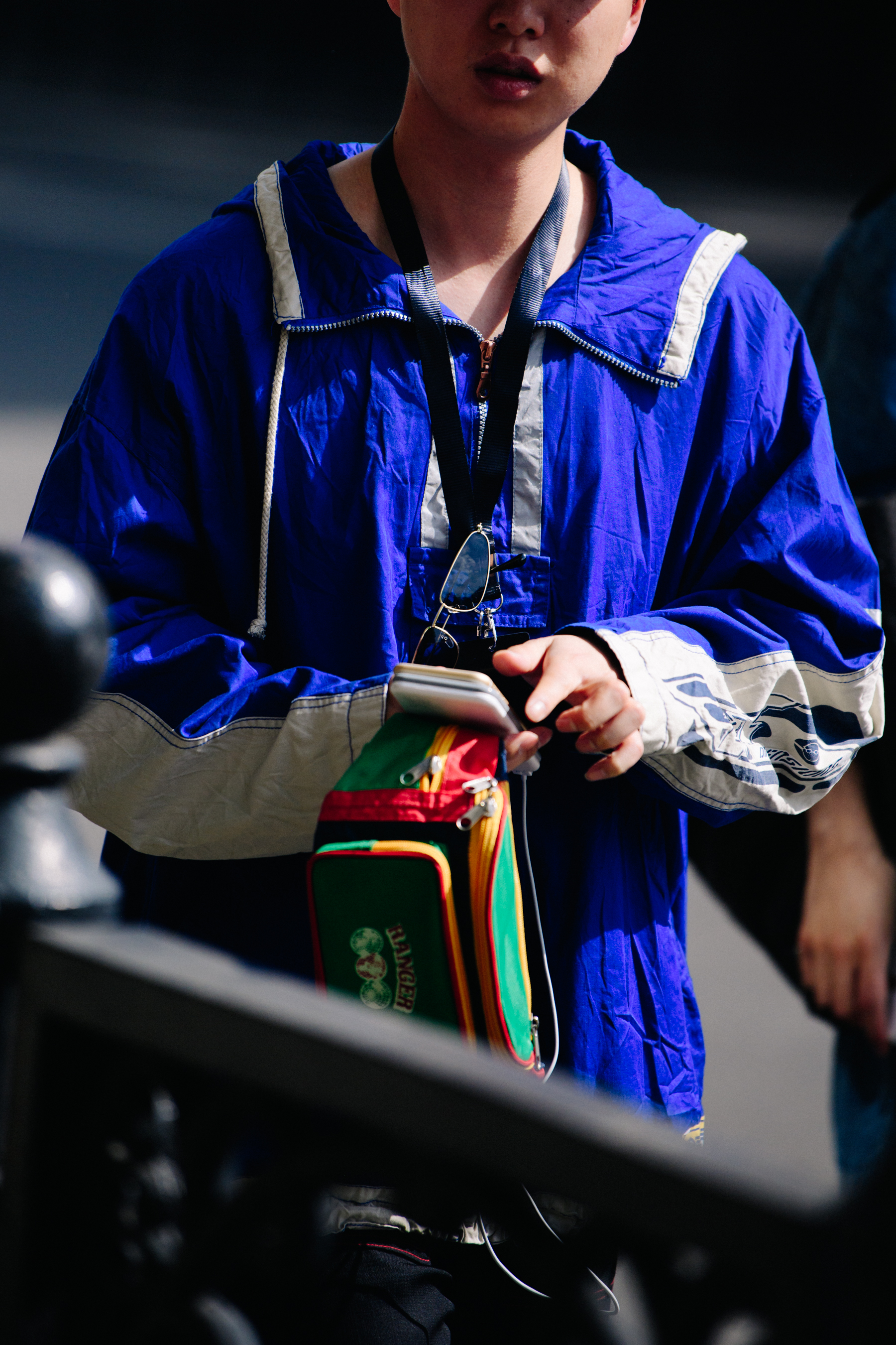 Korean man wearing blue top