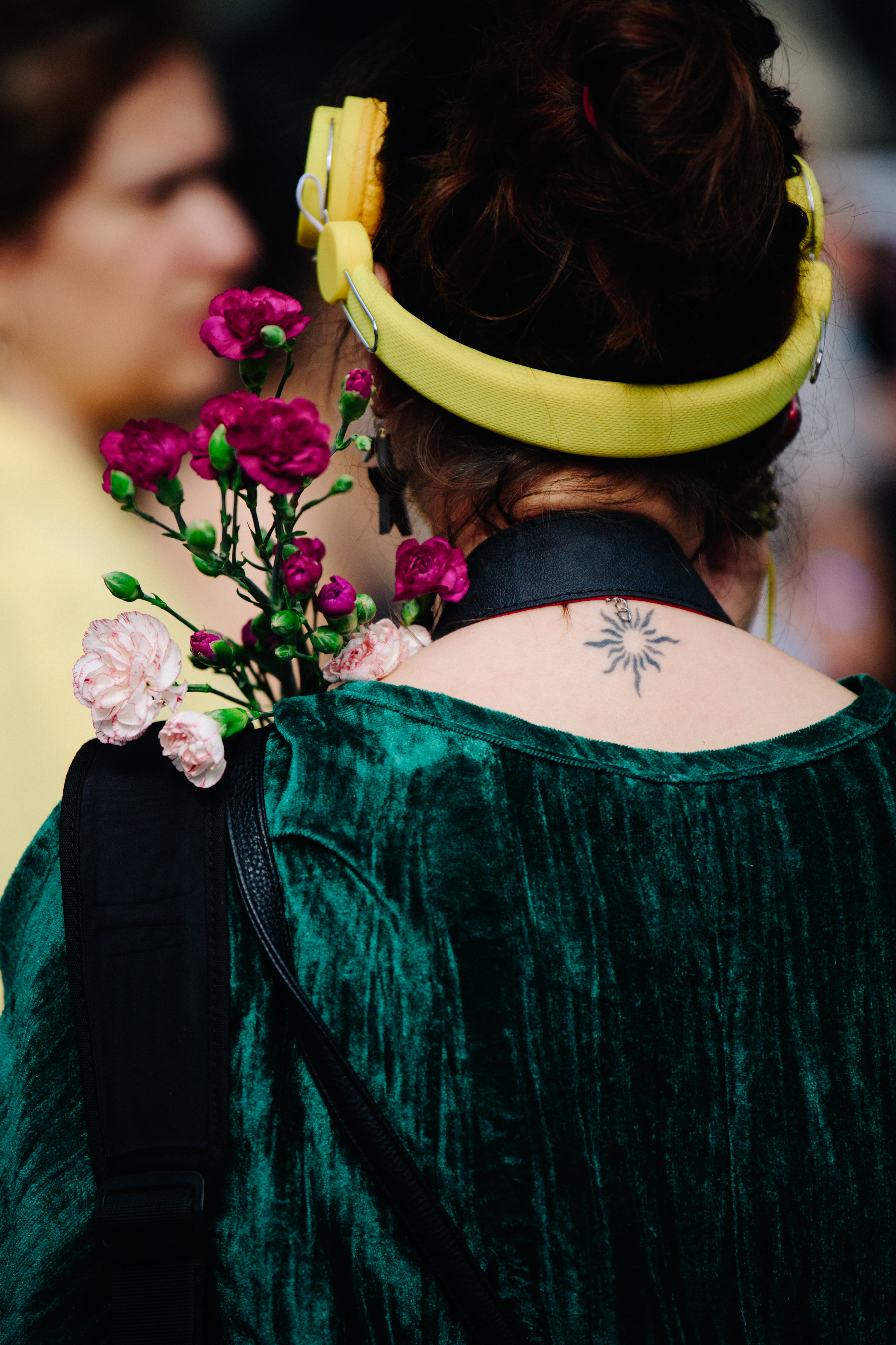 Woman carrying flowers