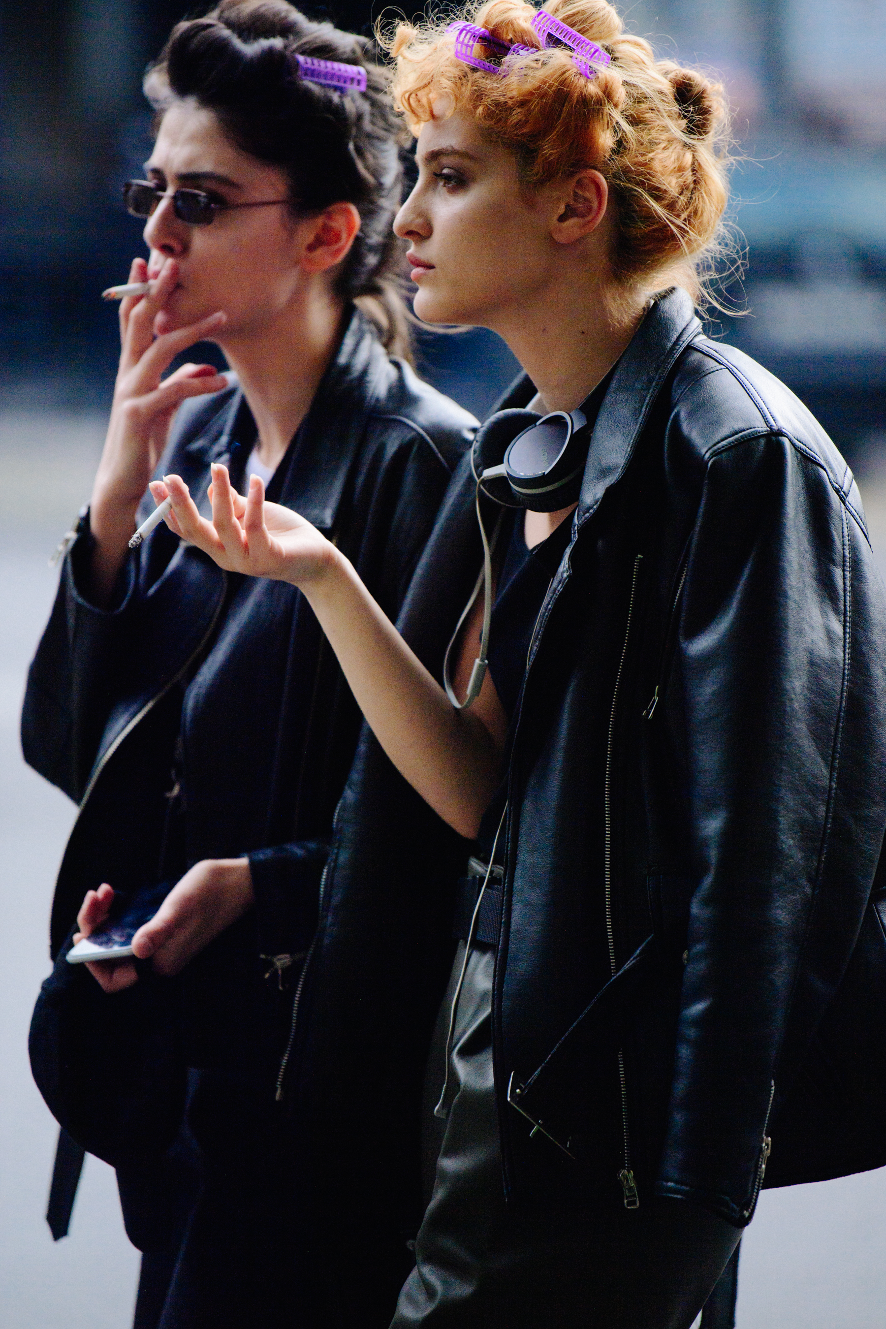 Two models with hair rollers in