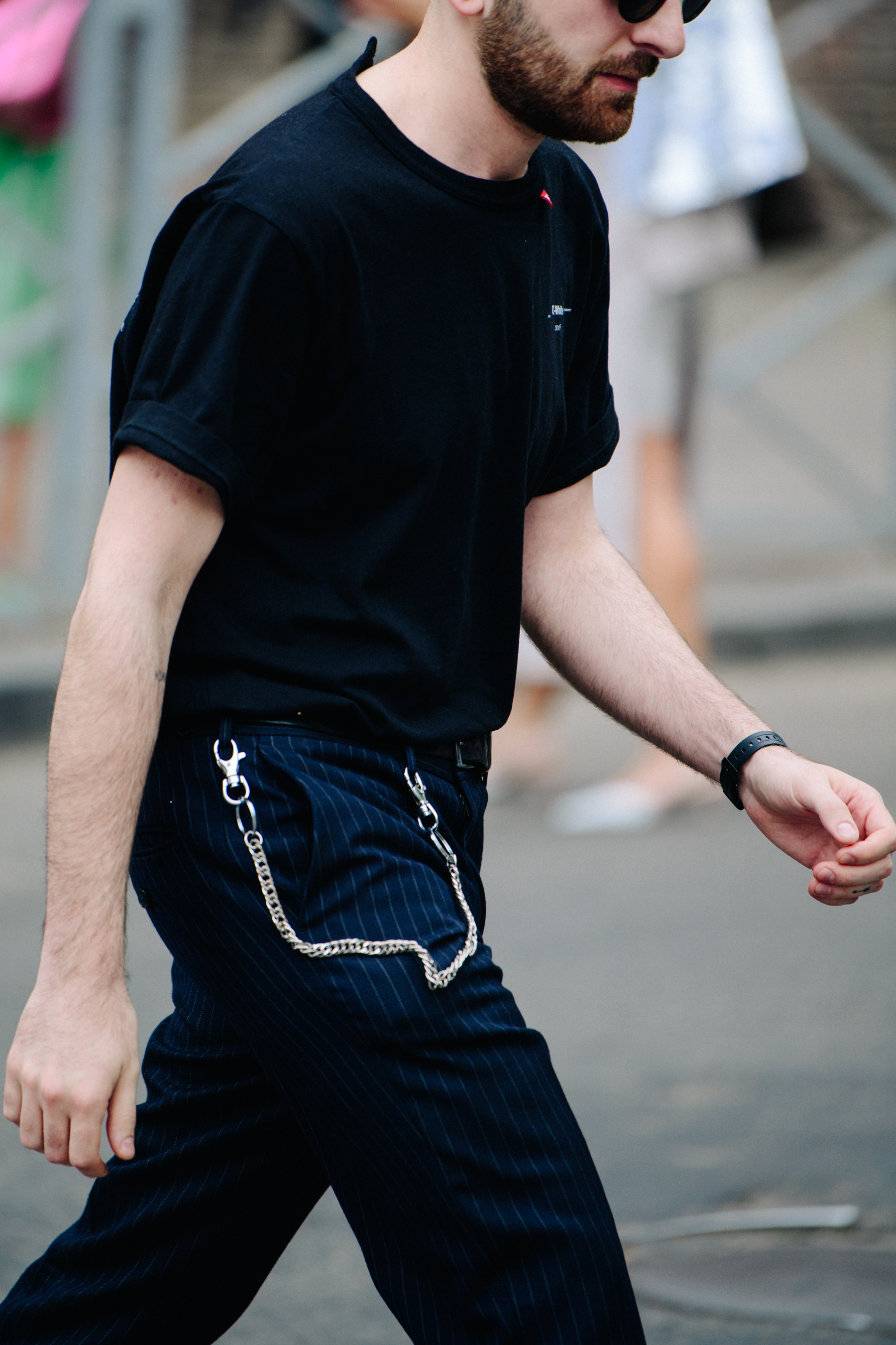 Man wearing chain around pants