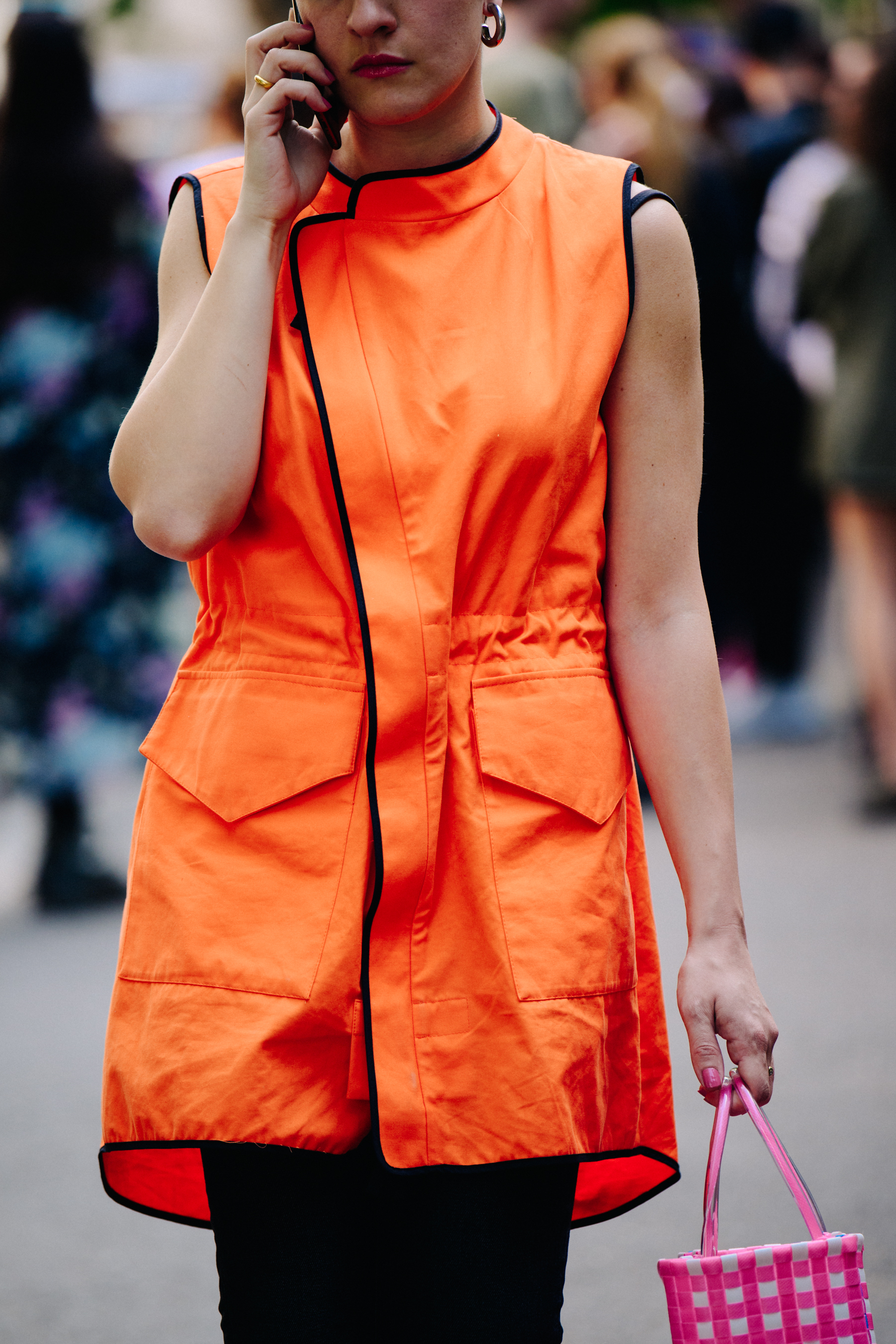 Woman wearing orange dress