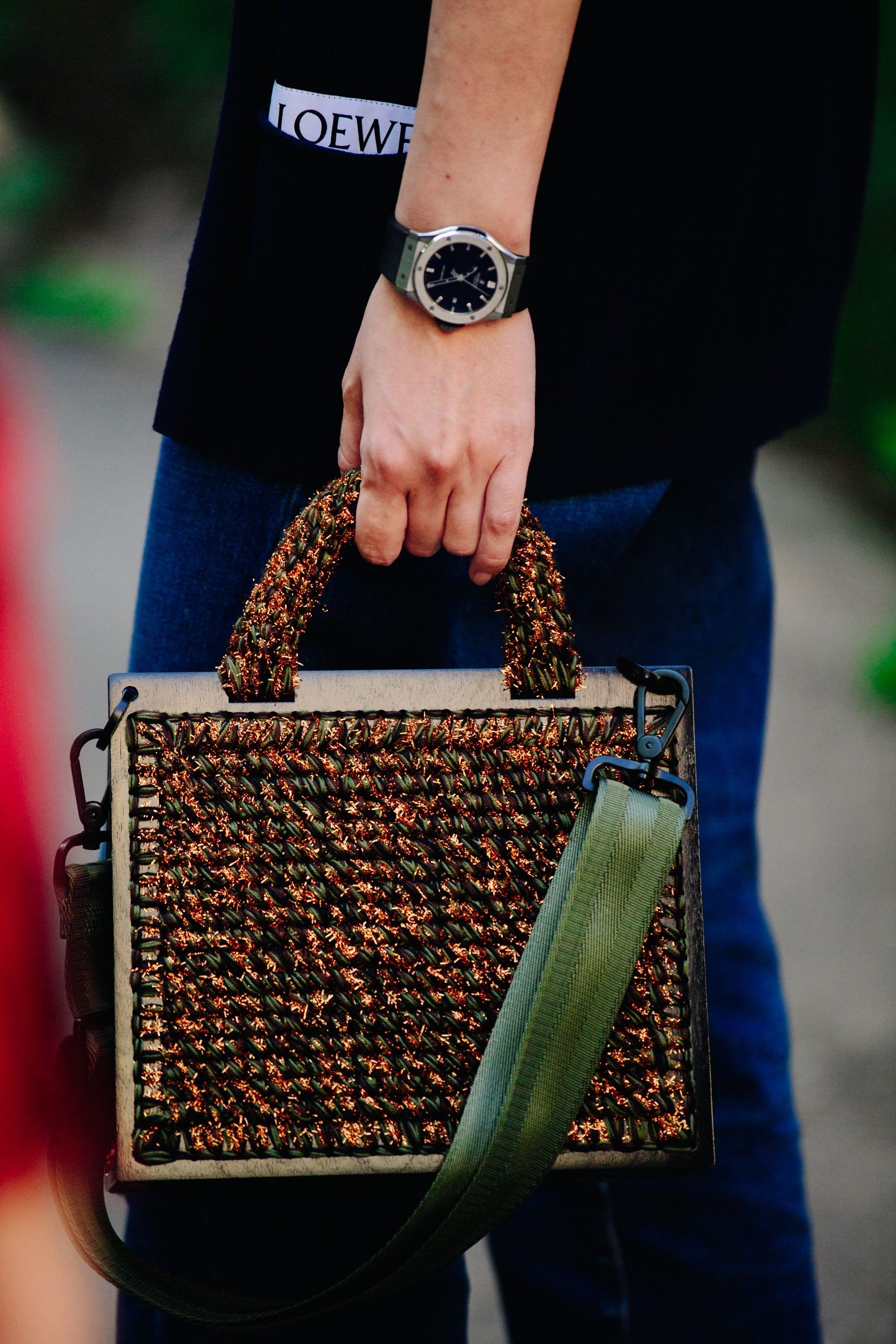 Woman carrying handbag