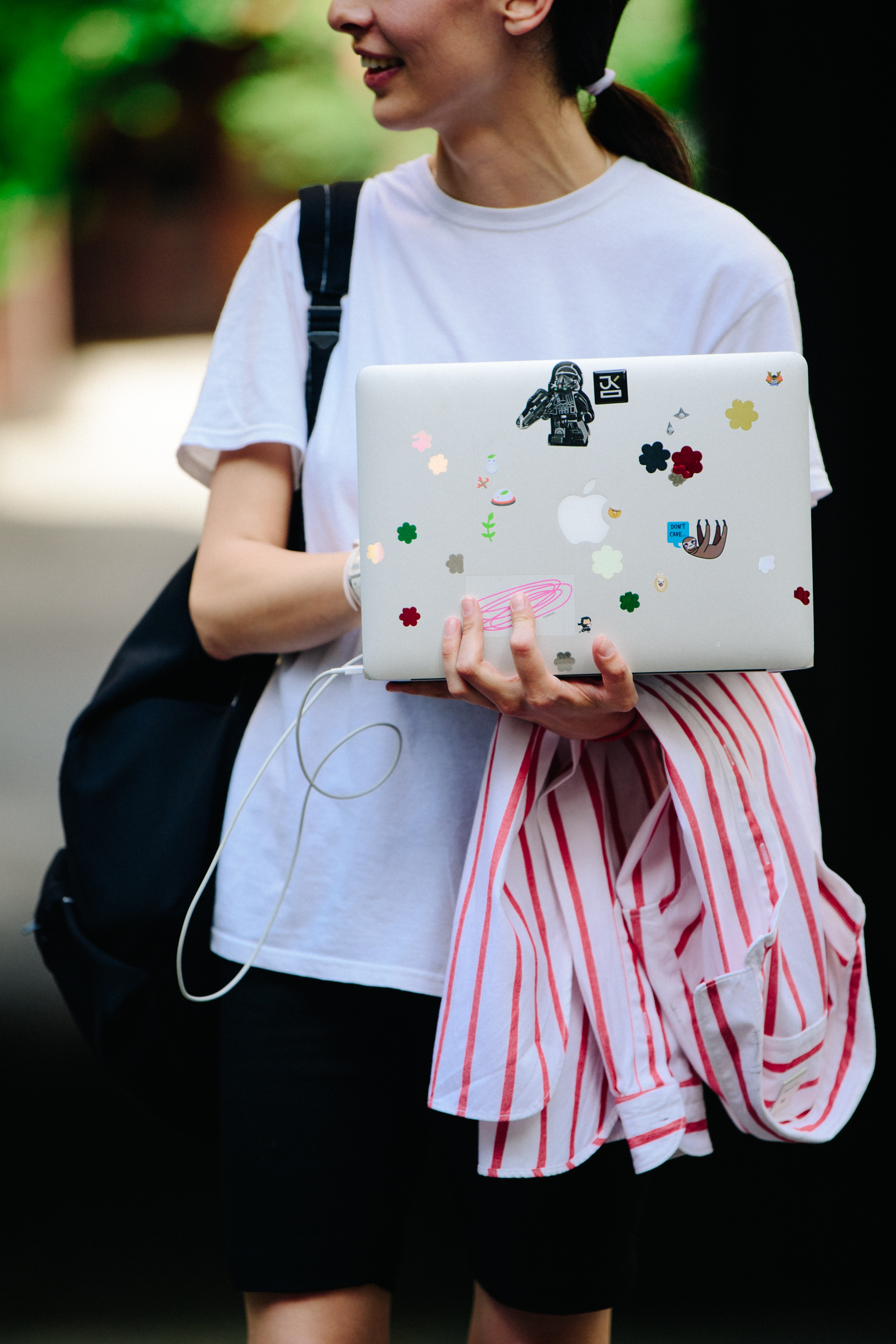 Georgian woman wearing white tee shirt