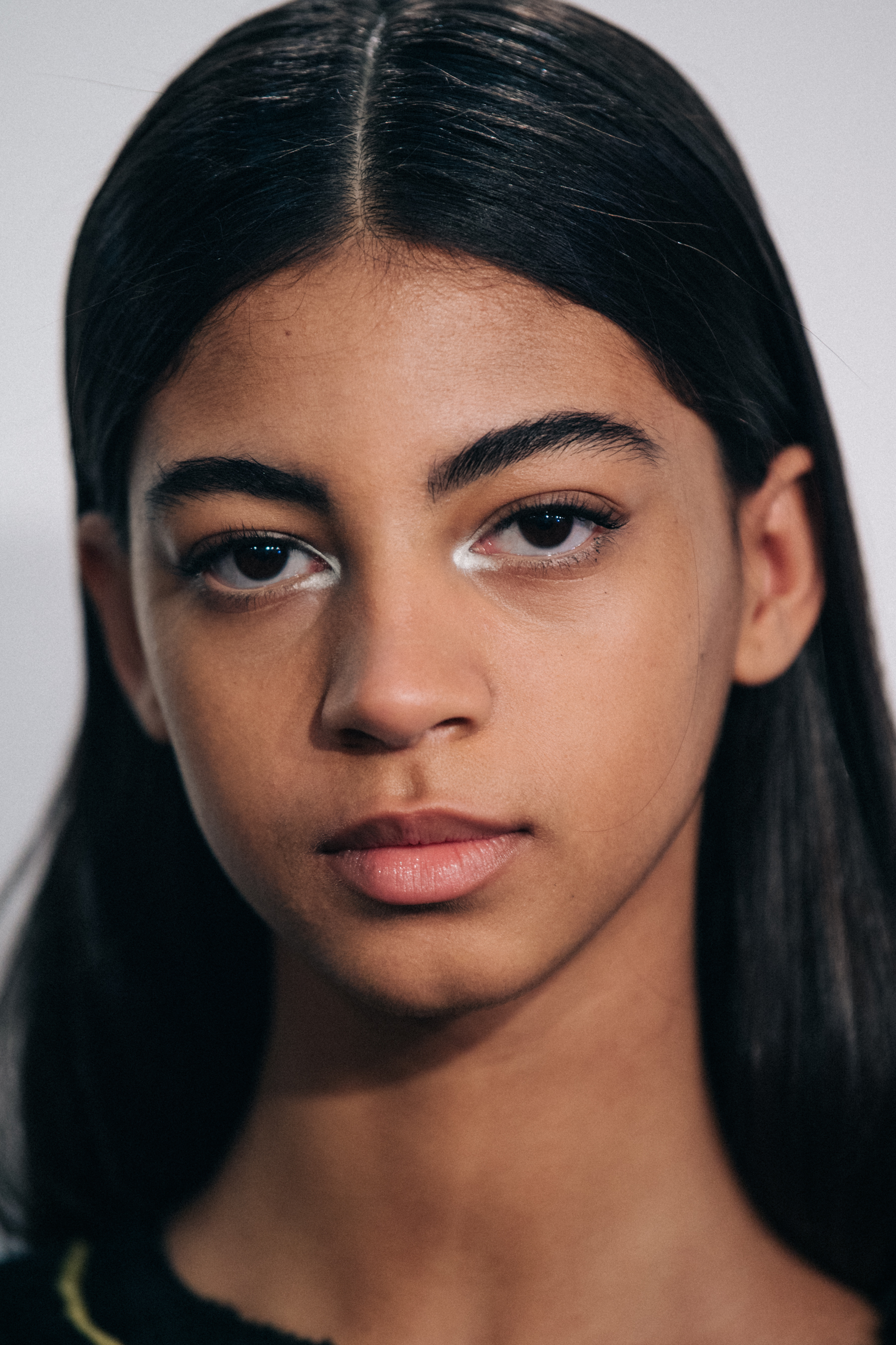 Portrait of model with long dark hair