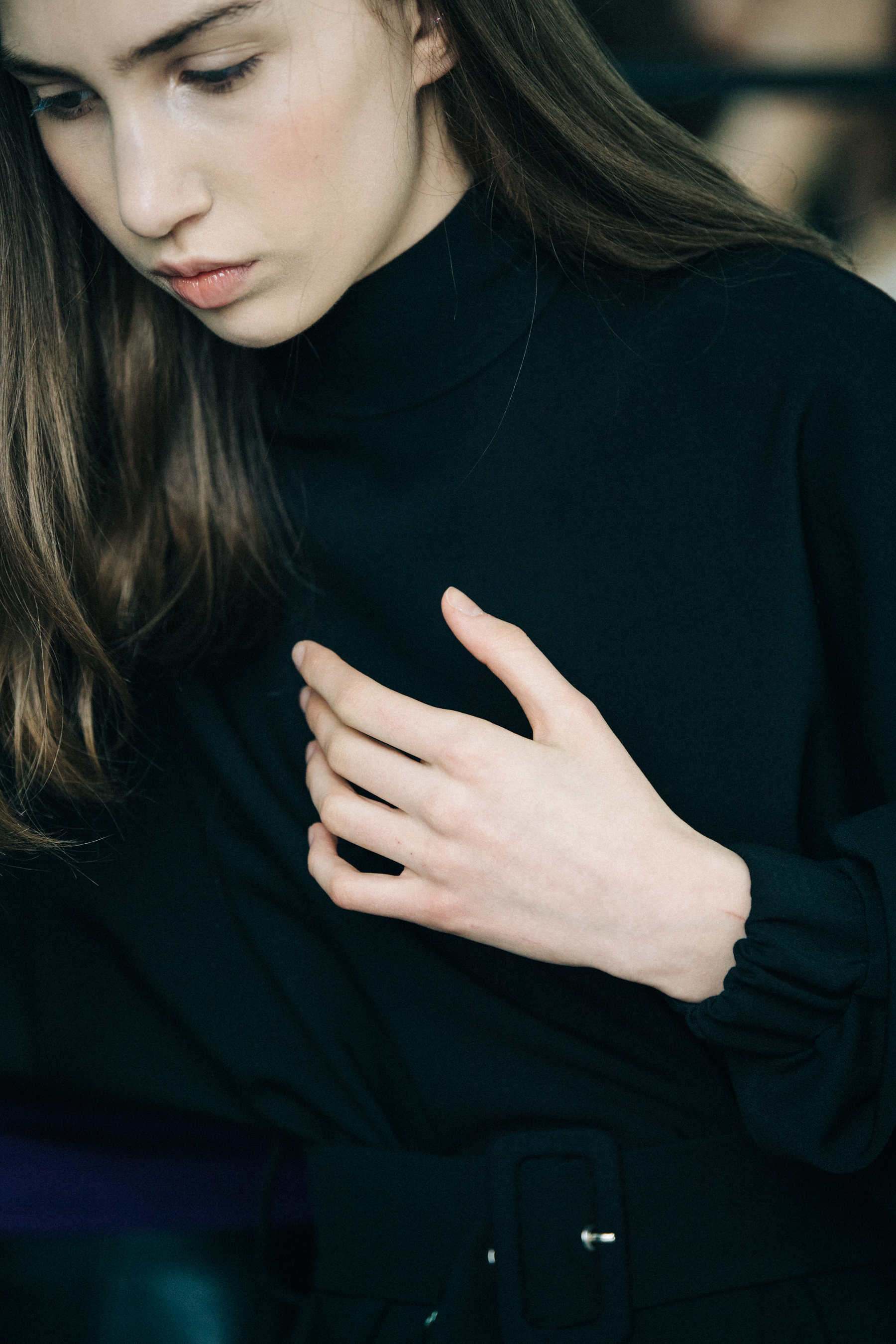 Model wearing black dress