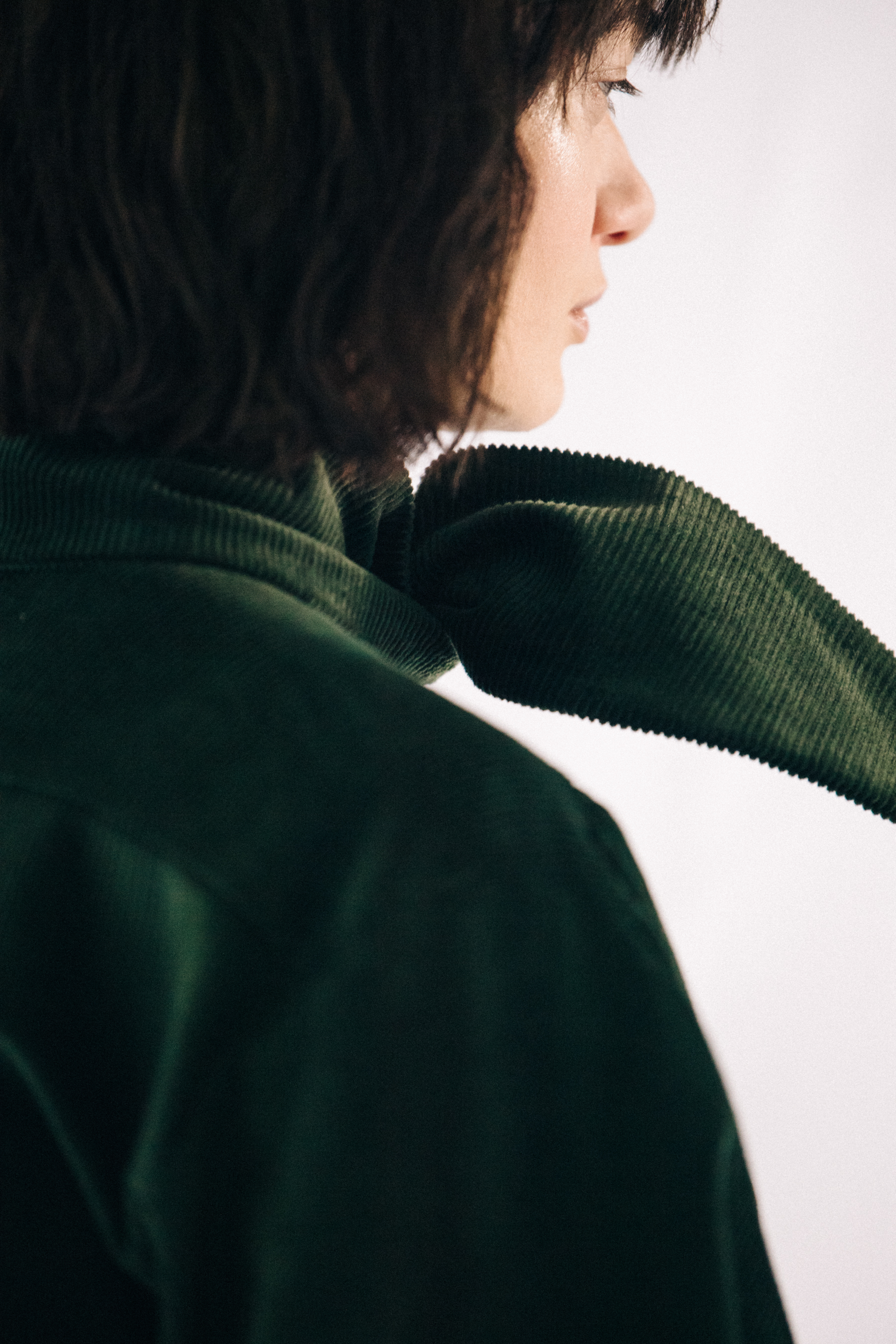 Model wearing green coat