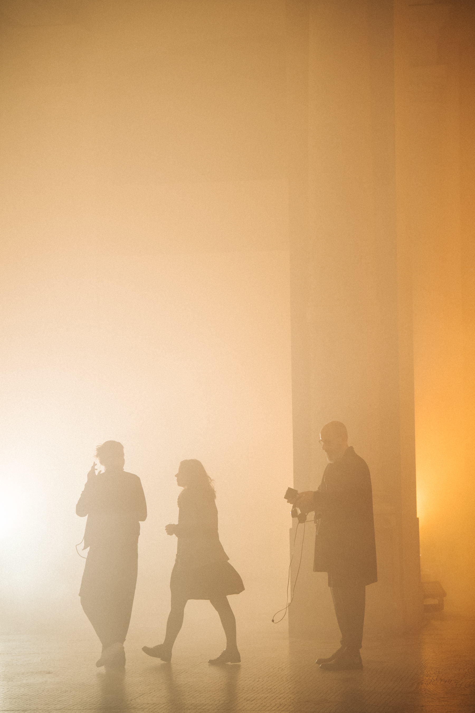 Poiret show venue in yellow light