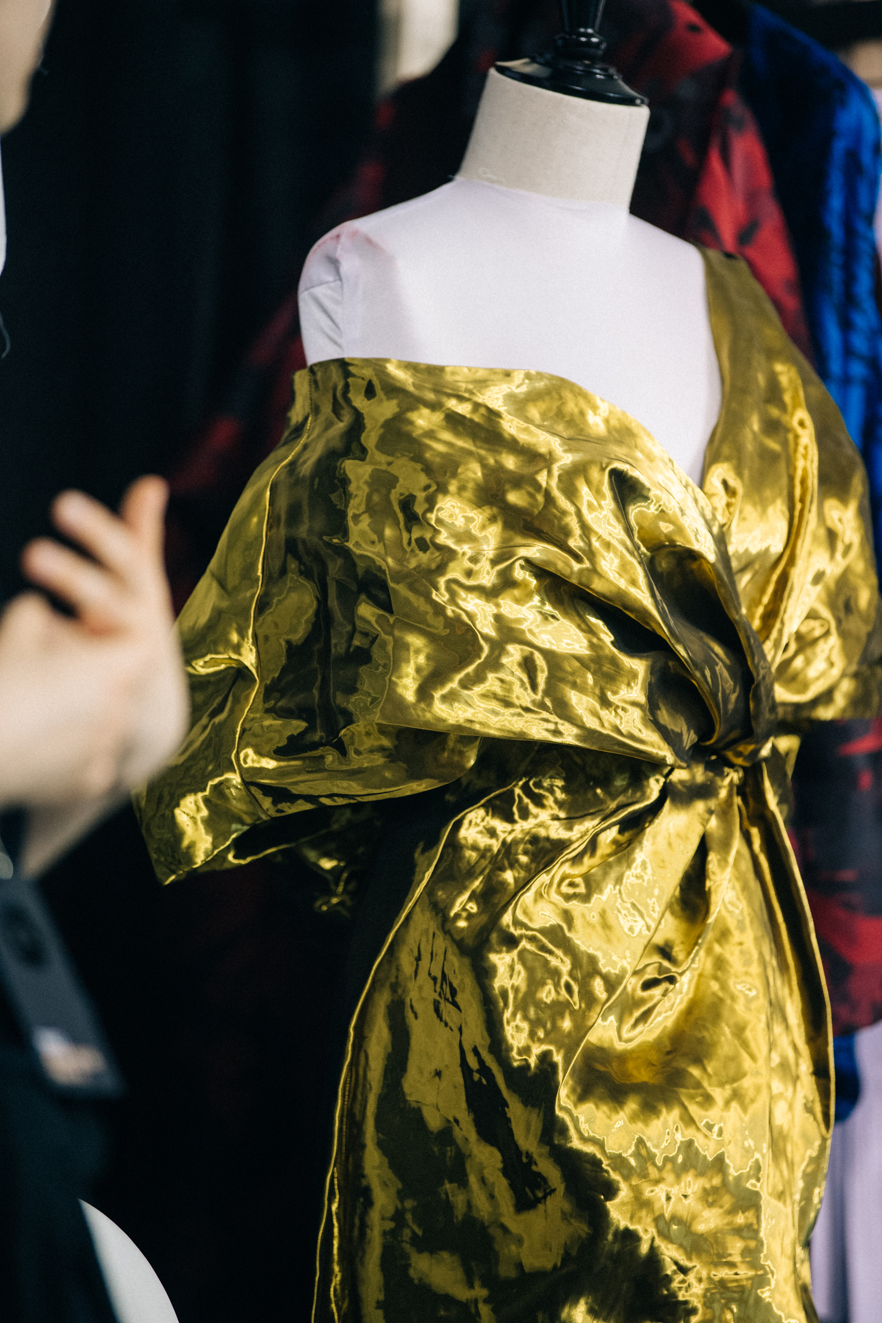 Gold dress backstage at Poiret