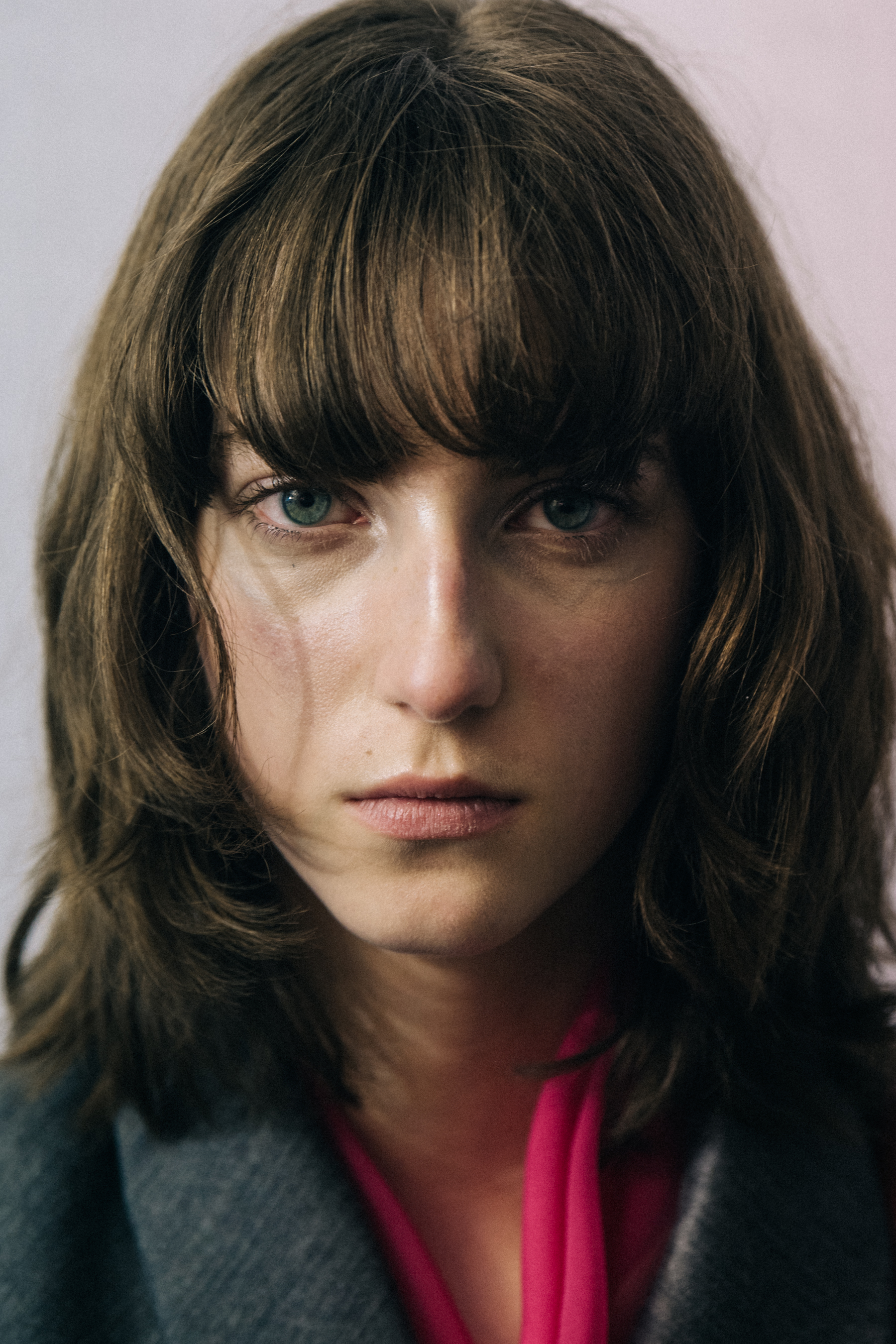 Portrait of model wearing pink shirt
