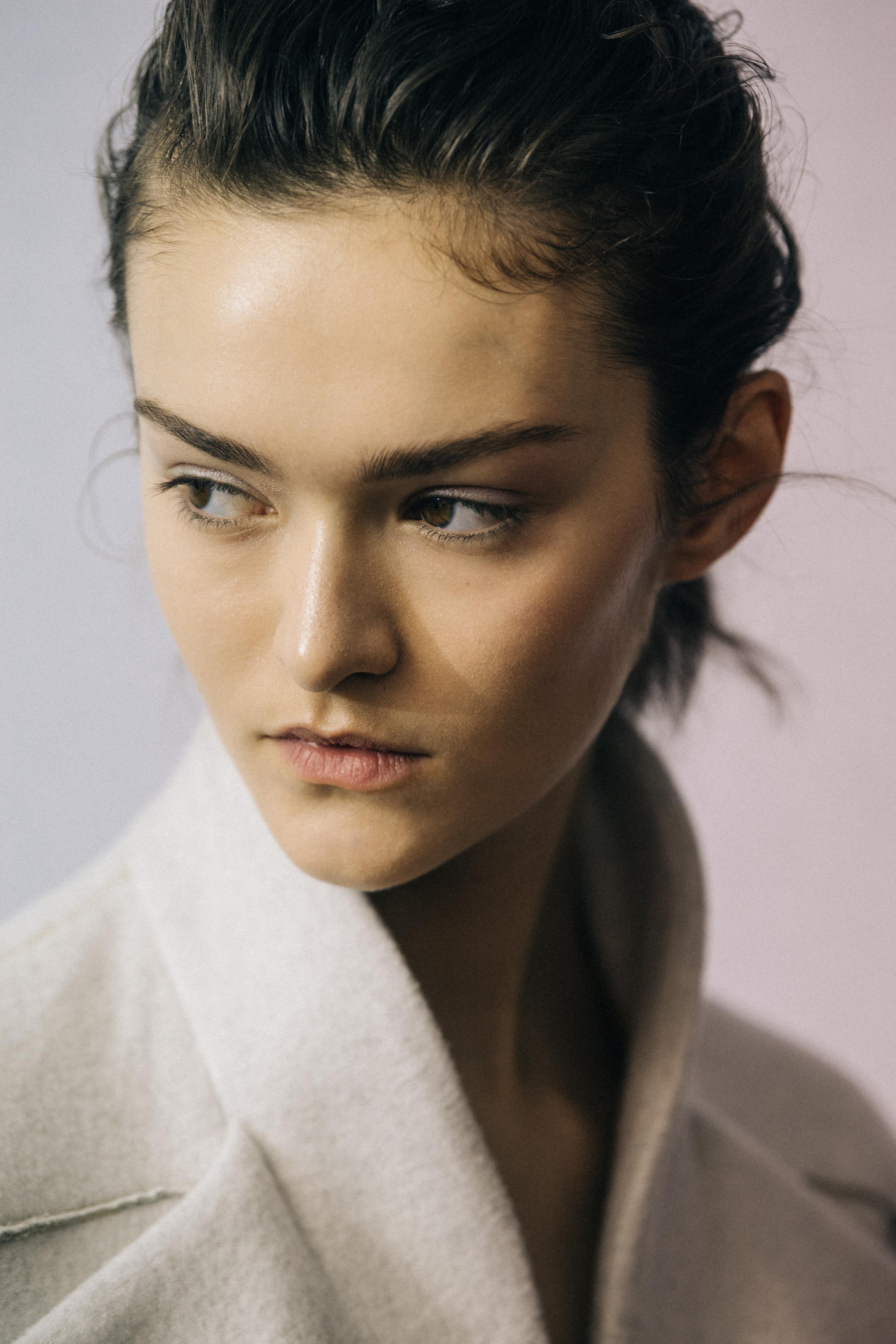 Model wearing white wool Poiret coat