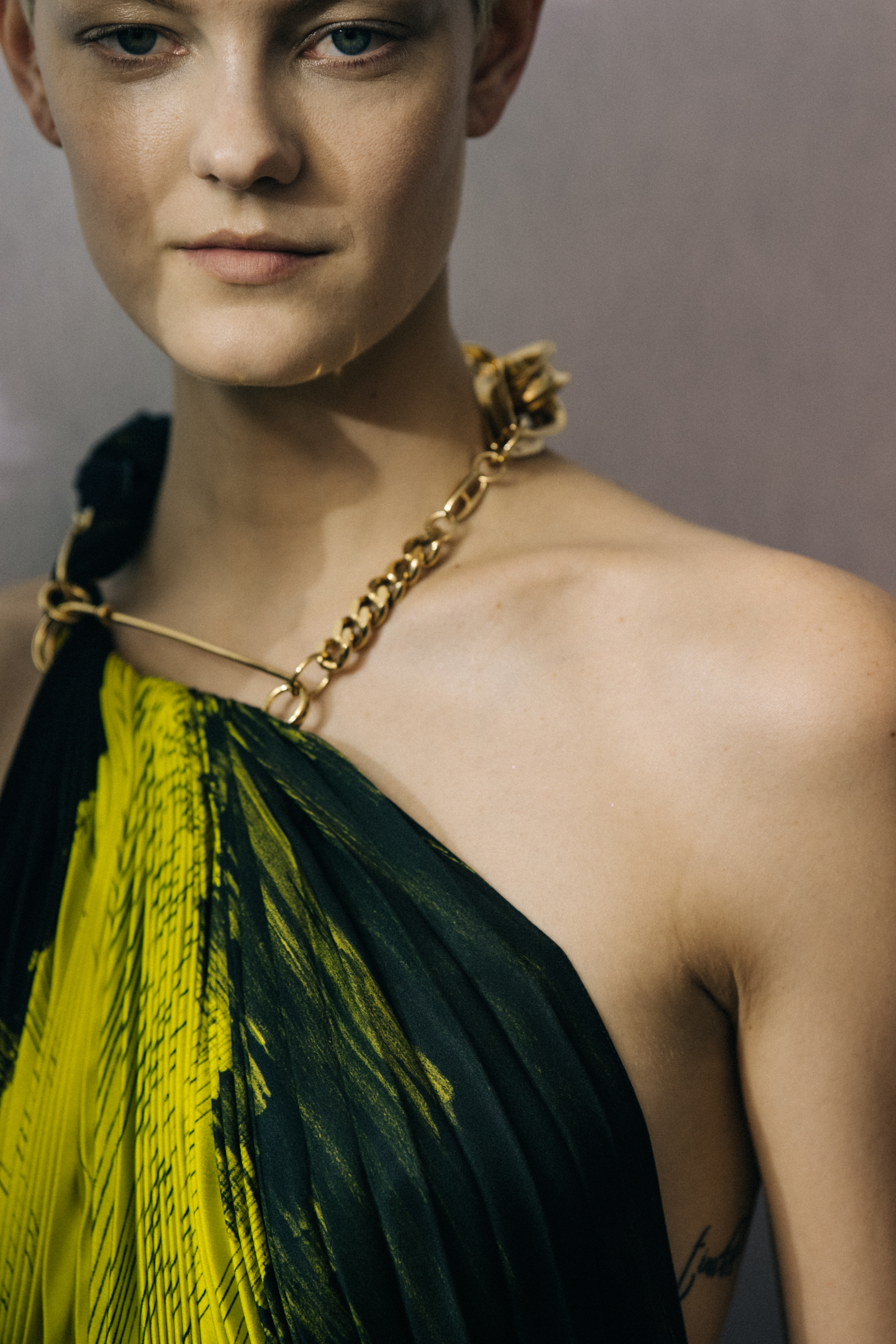 Model wearing yellow Poiret dress