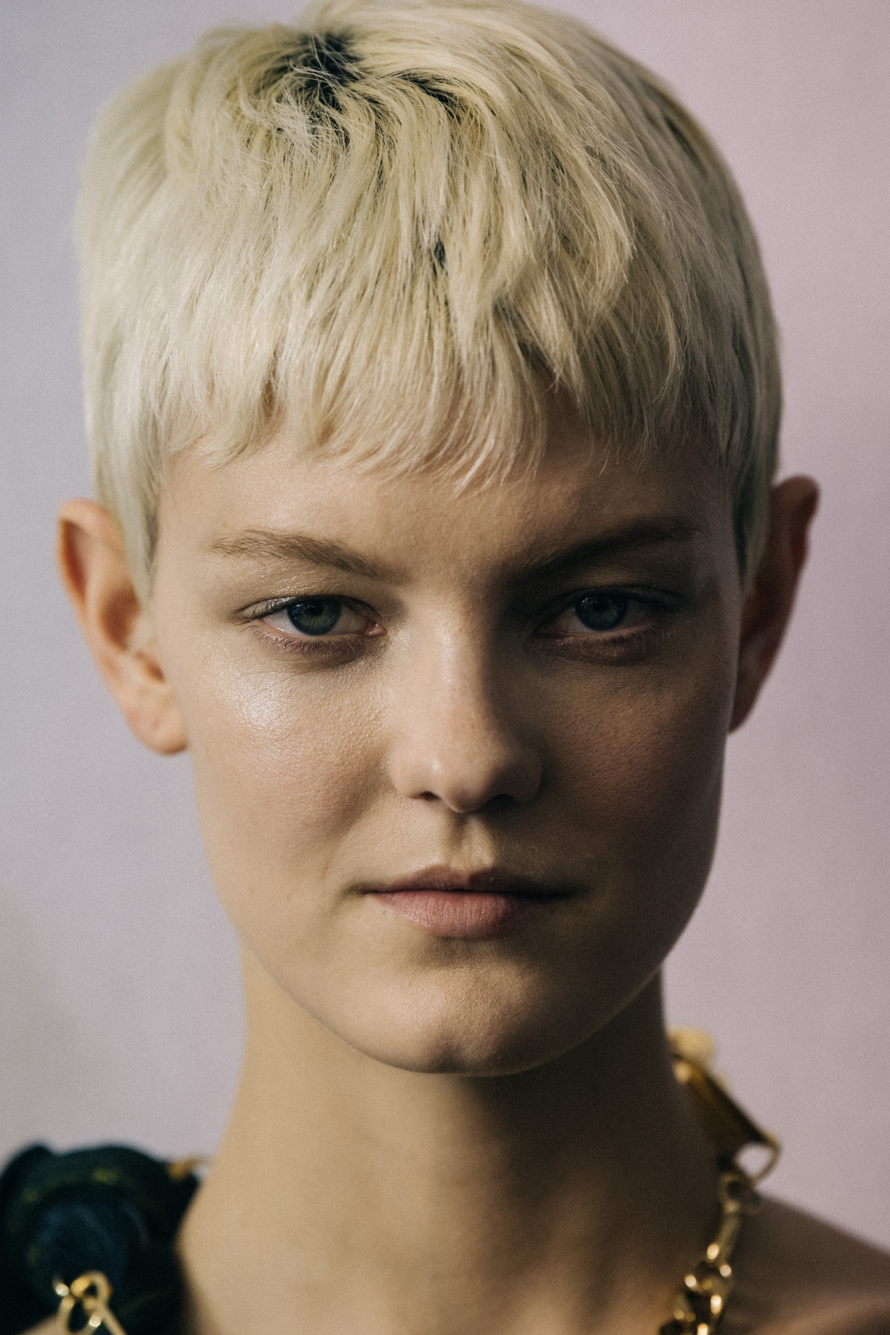 Portrait of model with short blonde hair