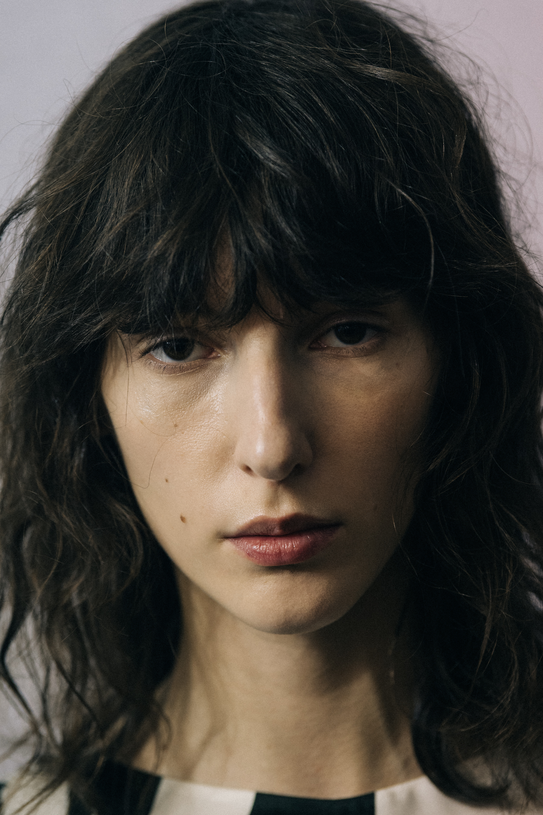 Portrait of model with straight fringe