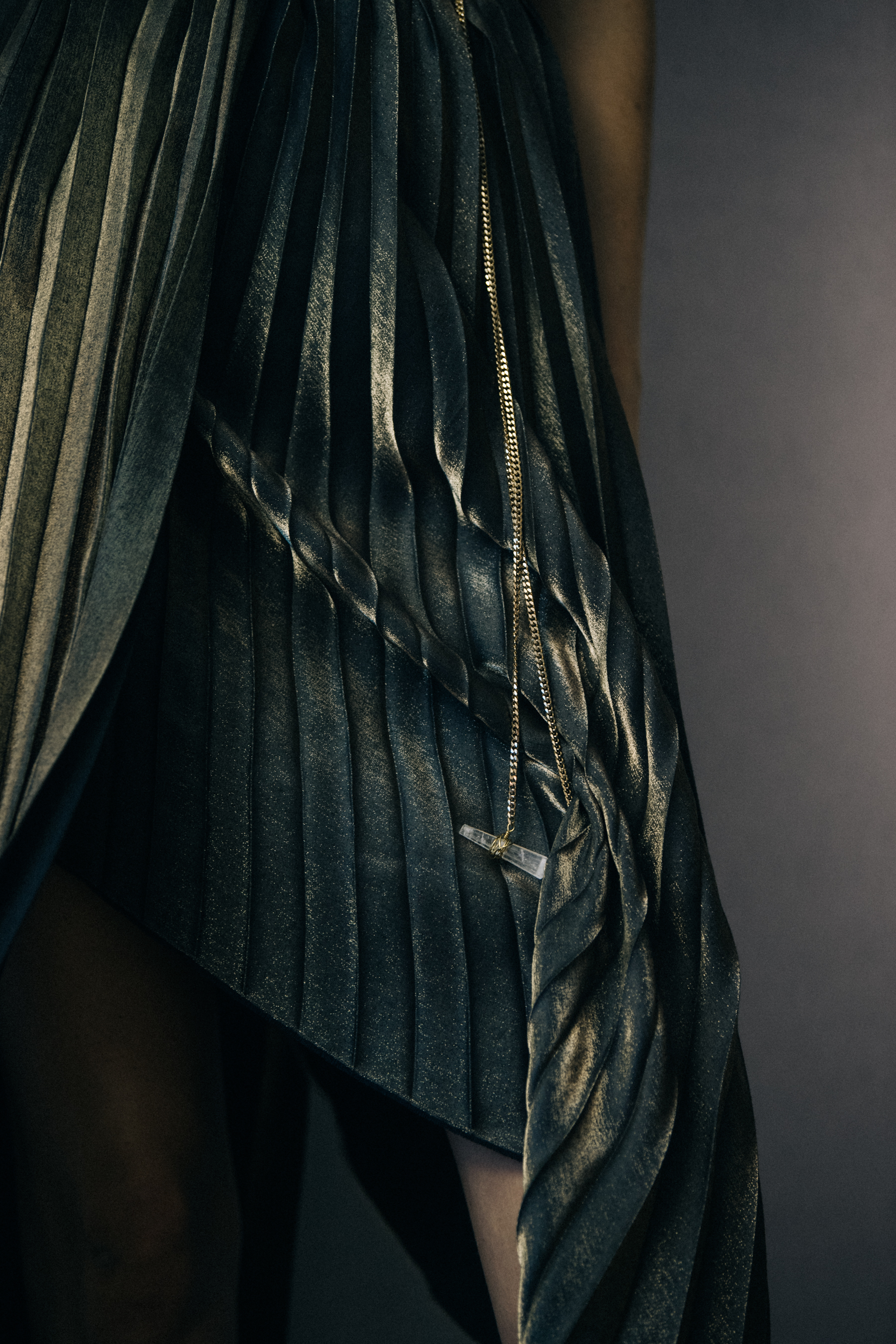 Model wearing dark gold dress at Poiret