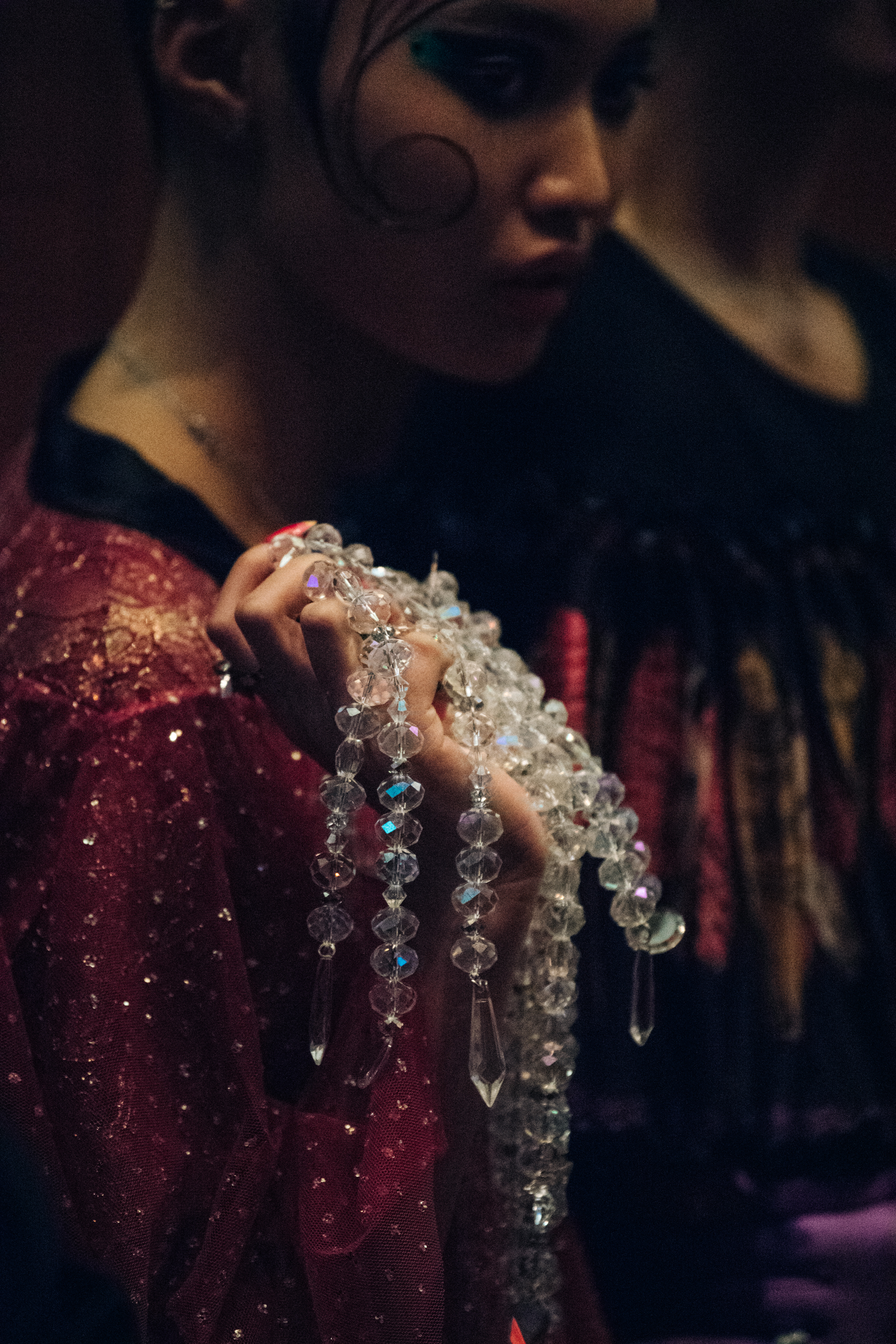 Model wearing gems and sequins