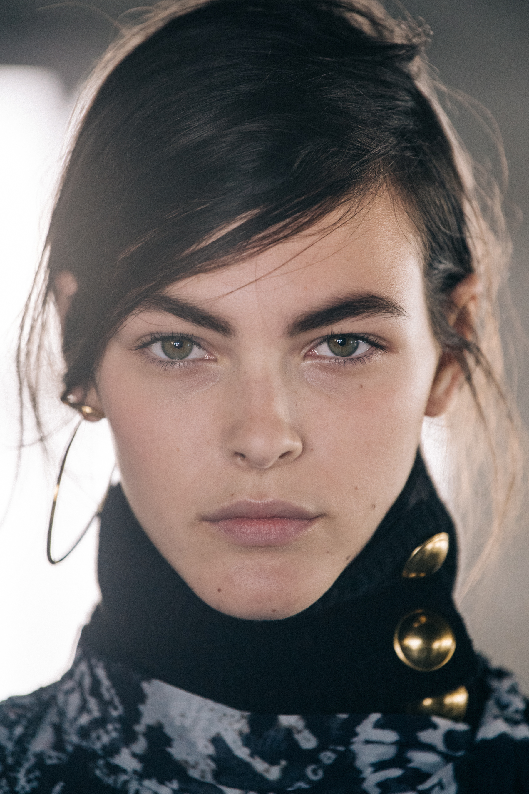 Portrait of Italian model backstage at Sacai