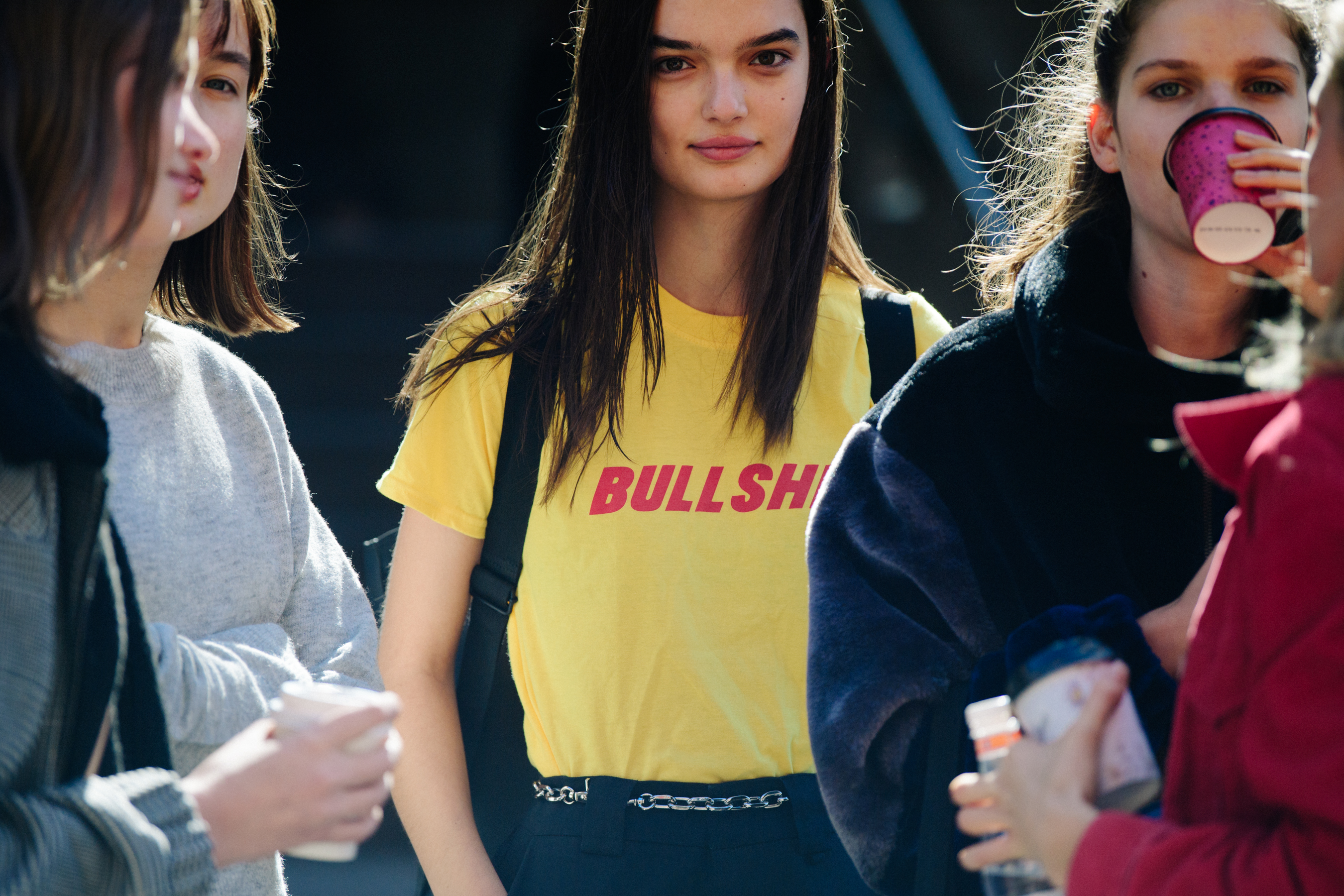 Model wearing yellow tee shirt