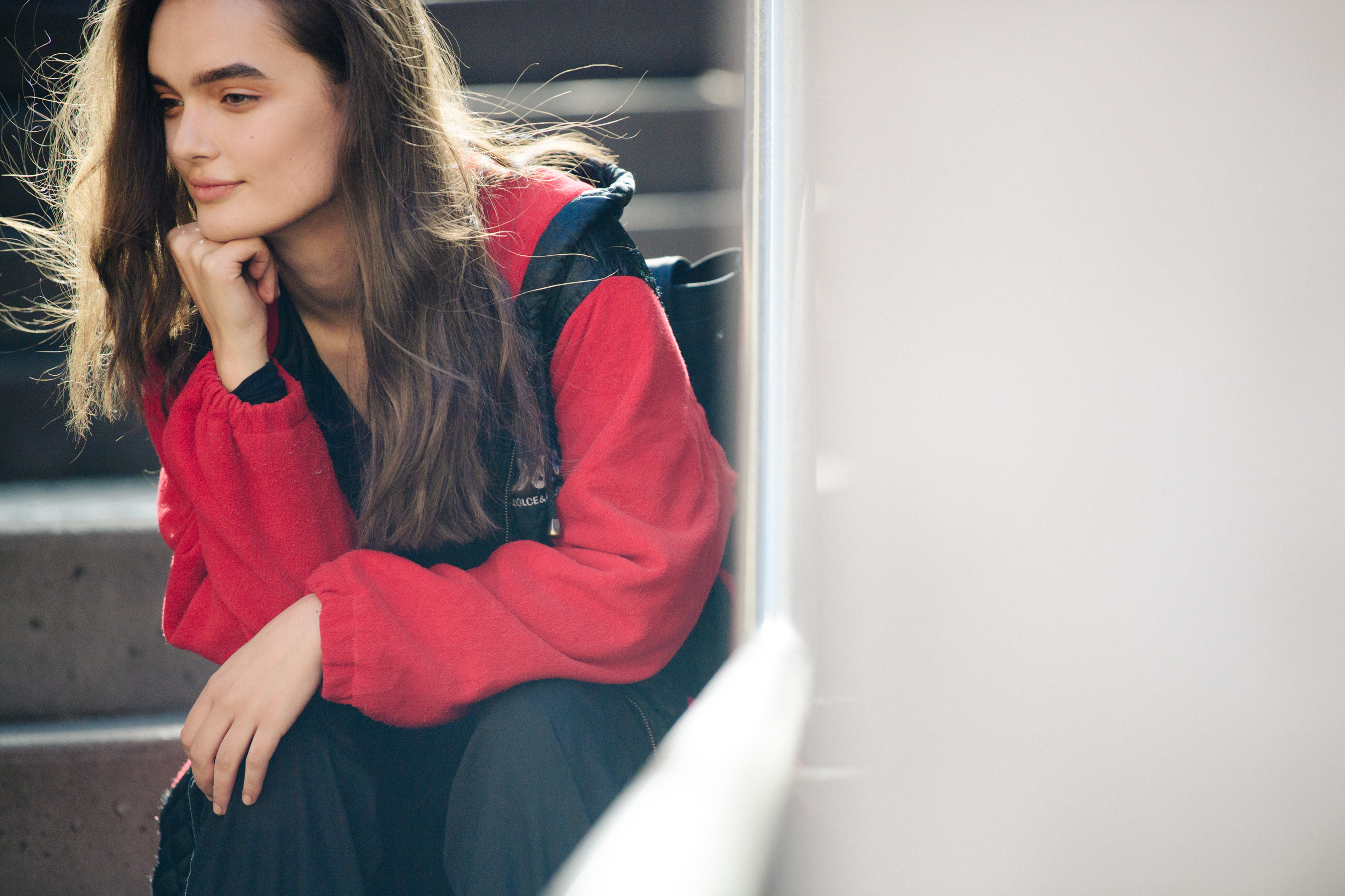 Model wearing red jacket