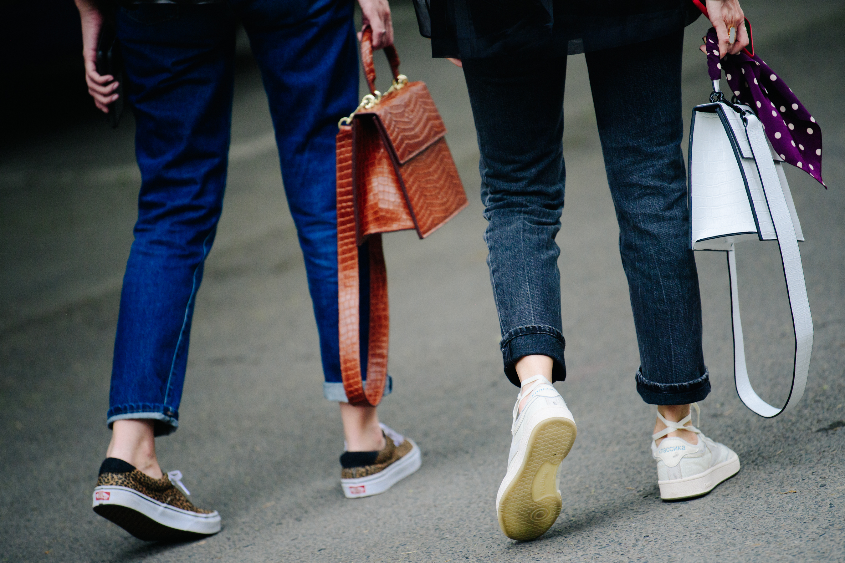 Two people wearing sneakers