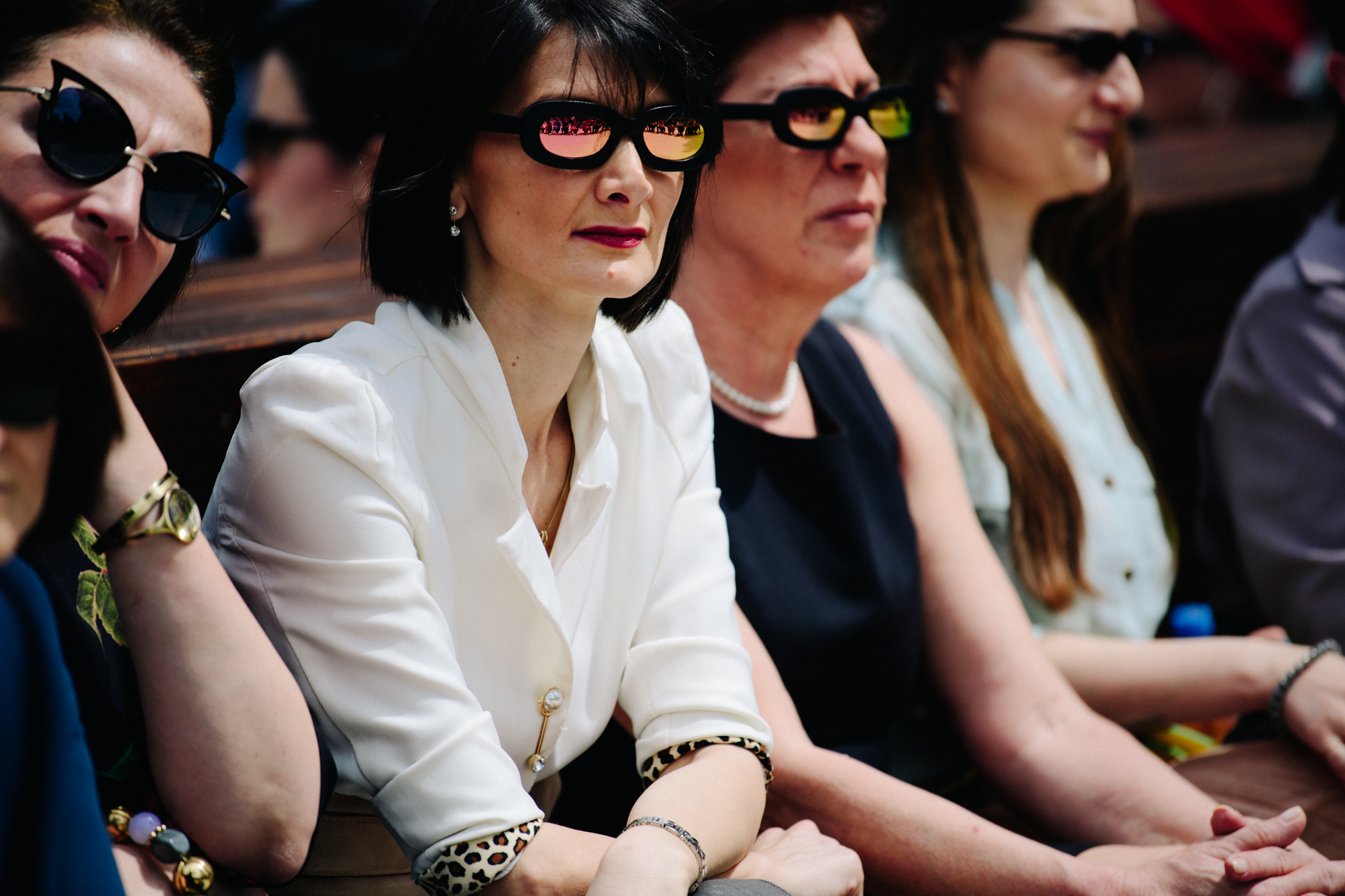 Women wearing matching sunglasses