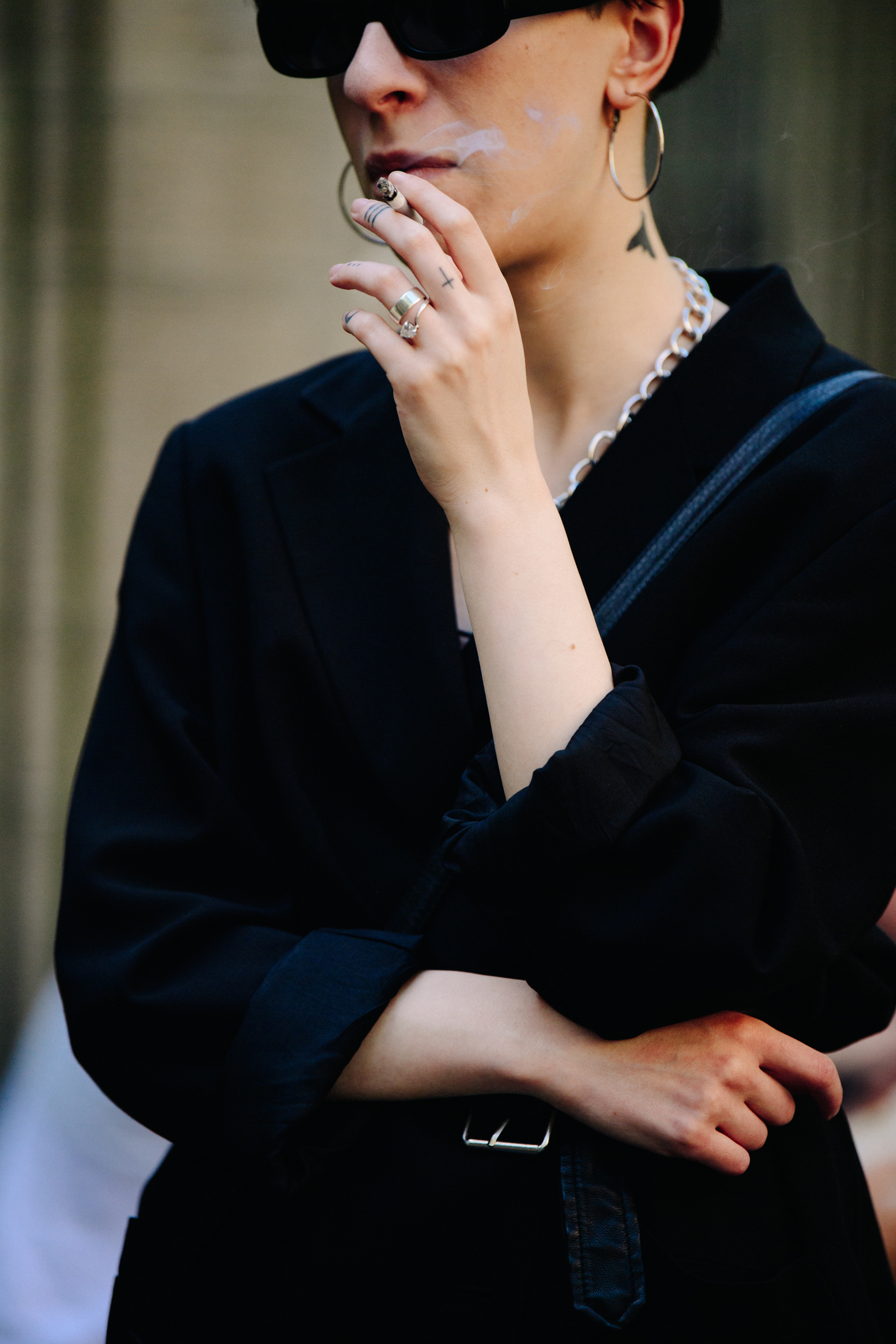 Woman wearing dark outfit