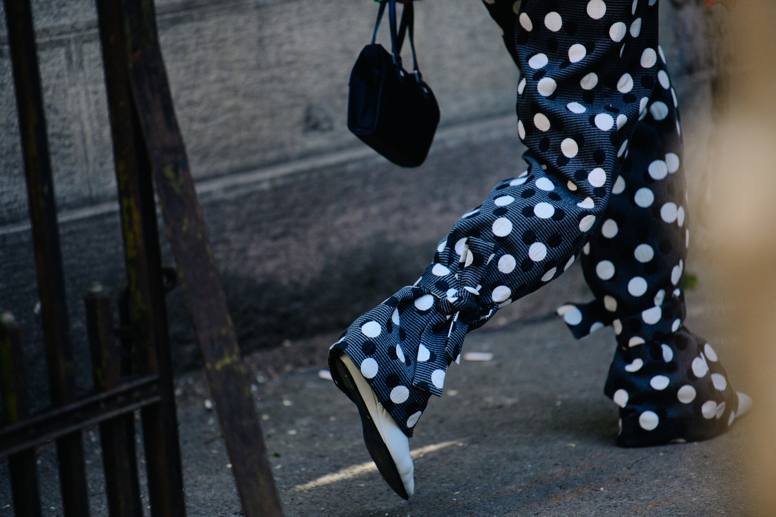Woman wearing spotted pants