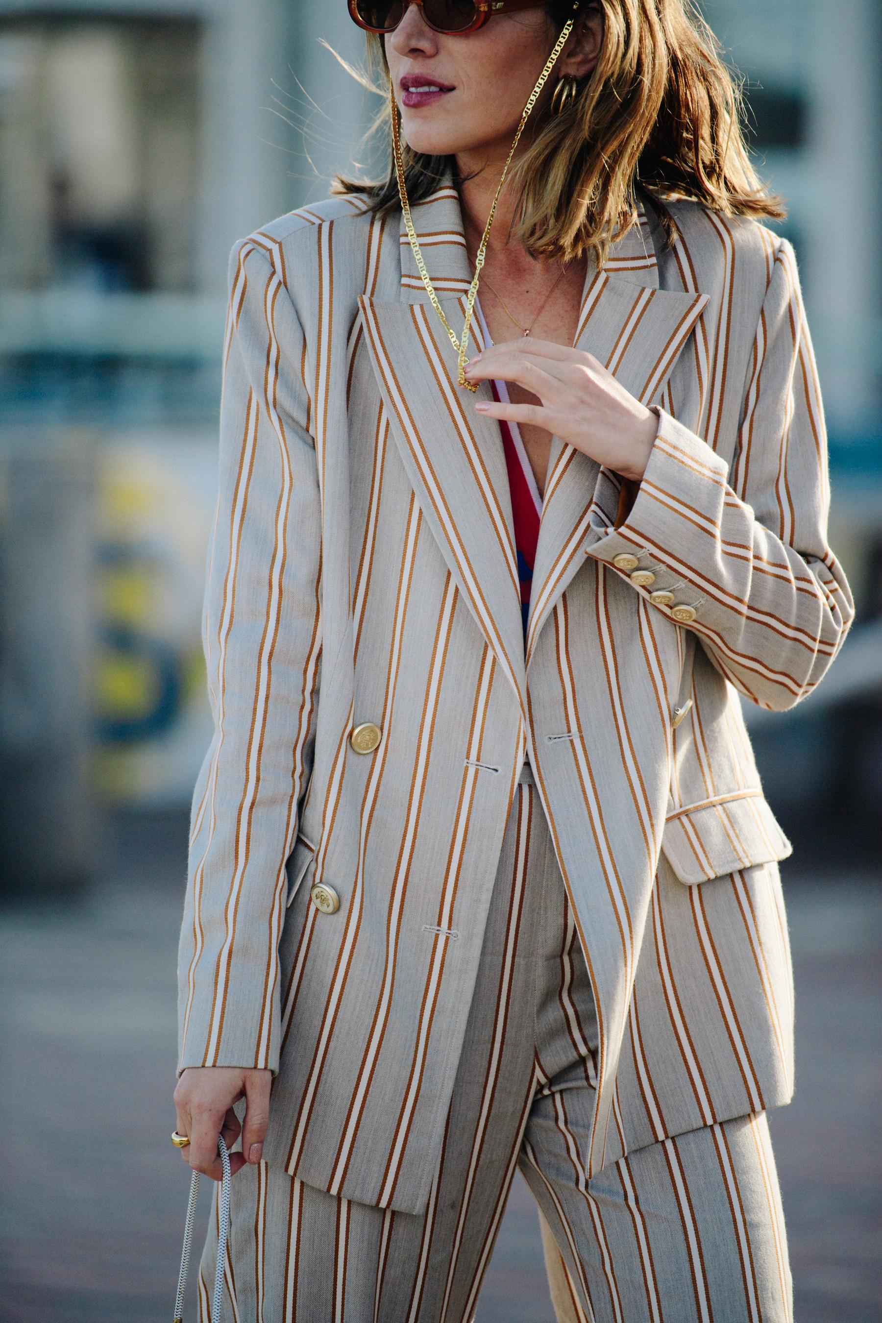 Woman wearing striped jacket