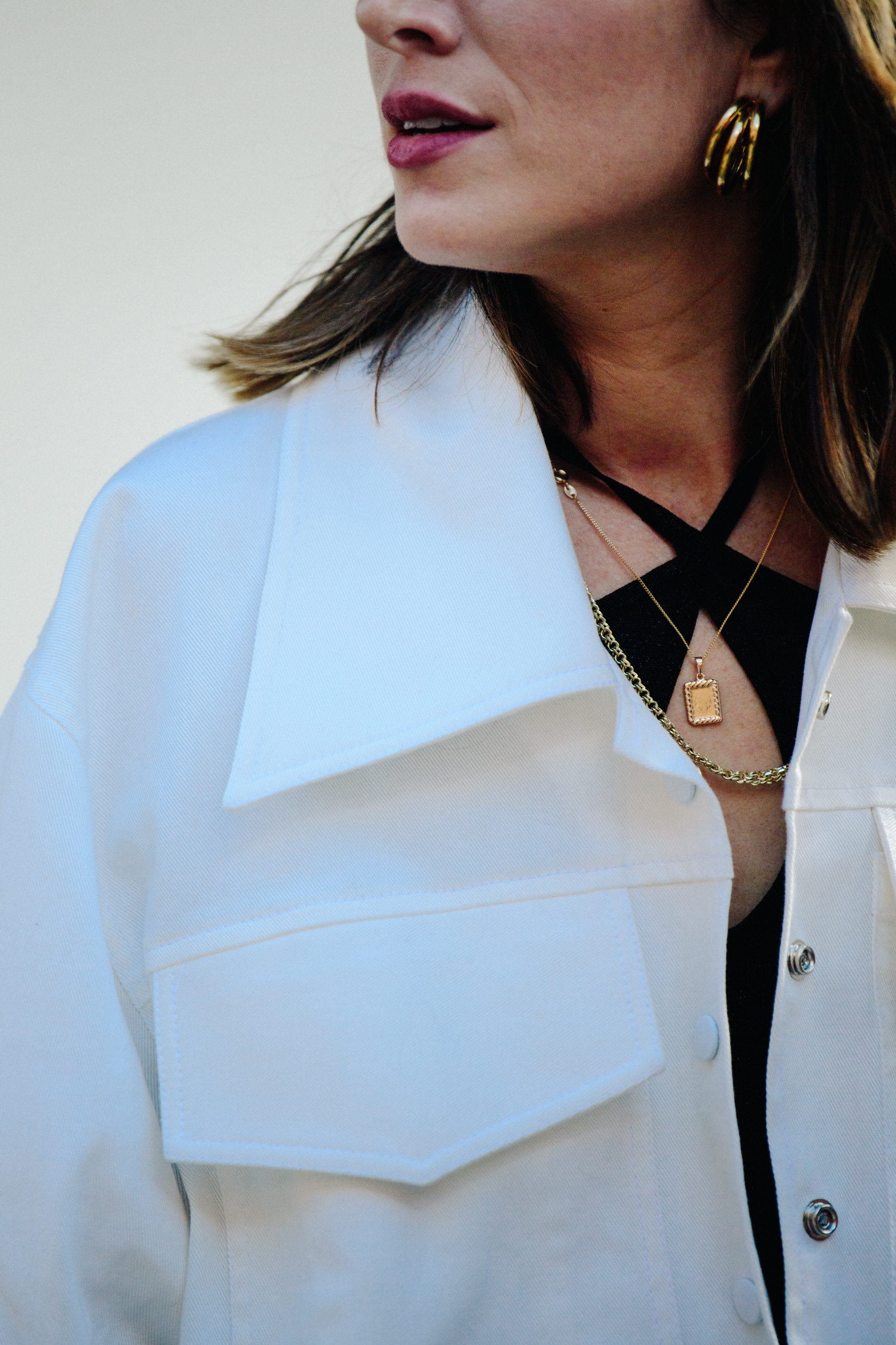 Woman wearing white jacket