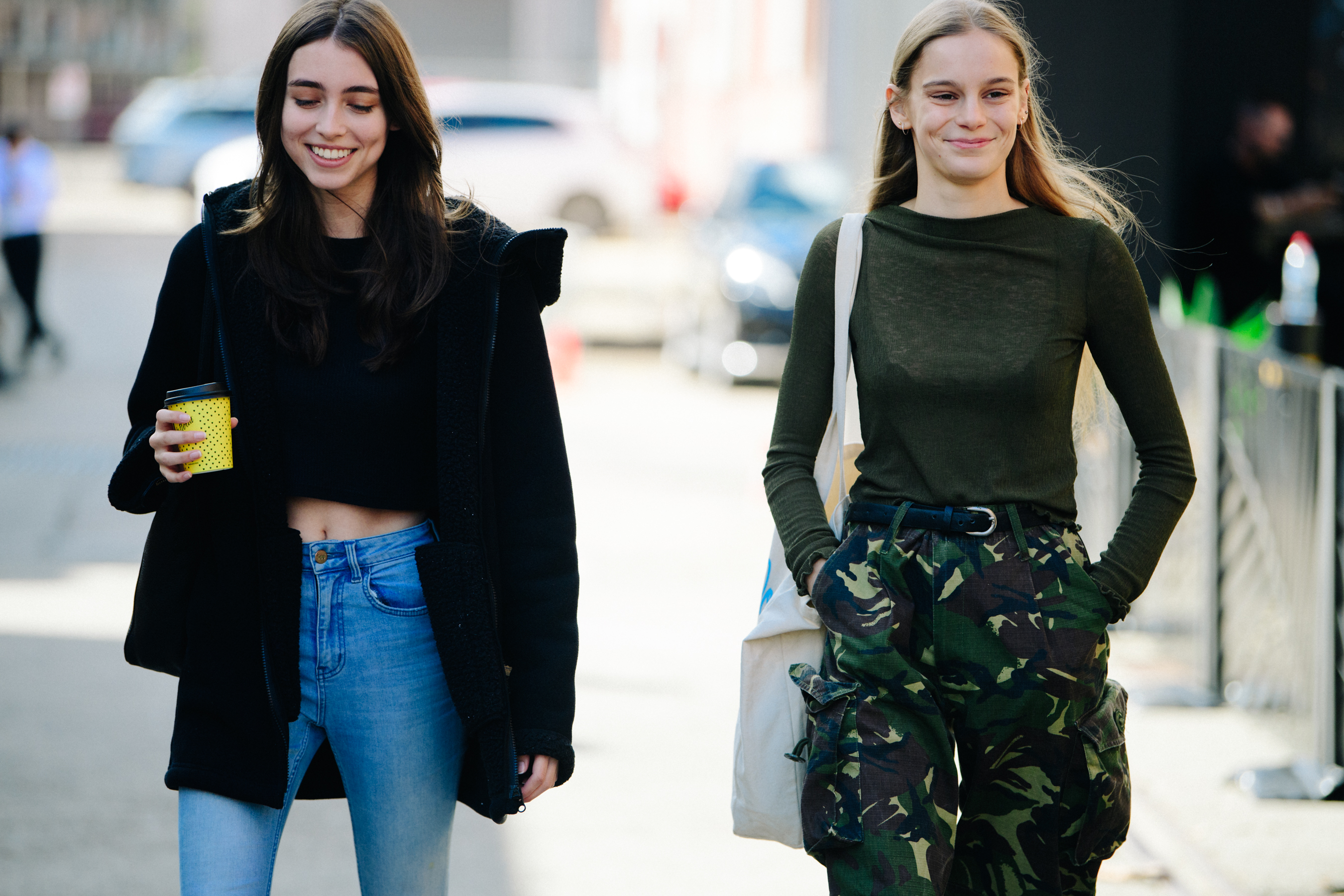 Two models wearing light clothing