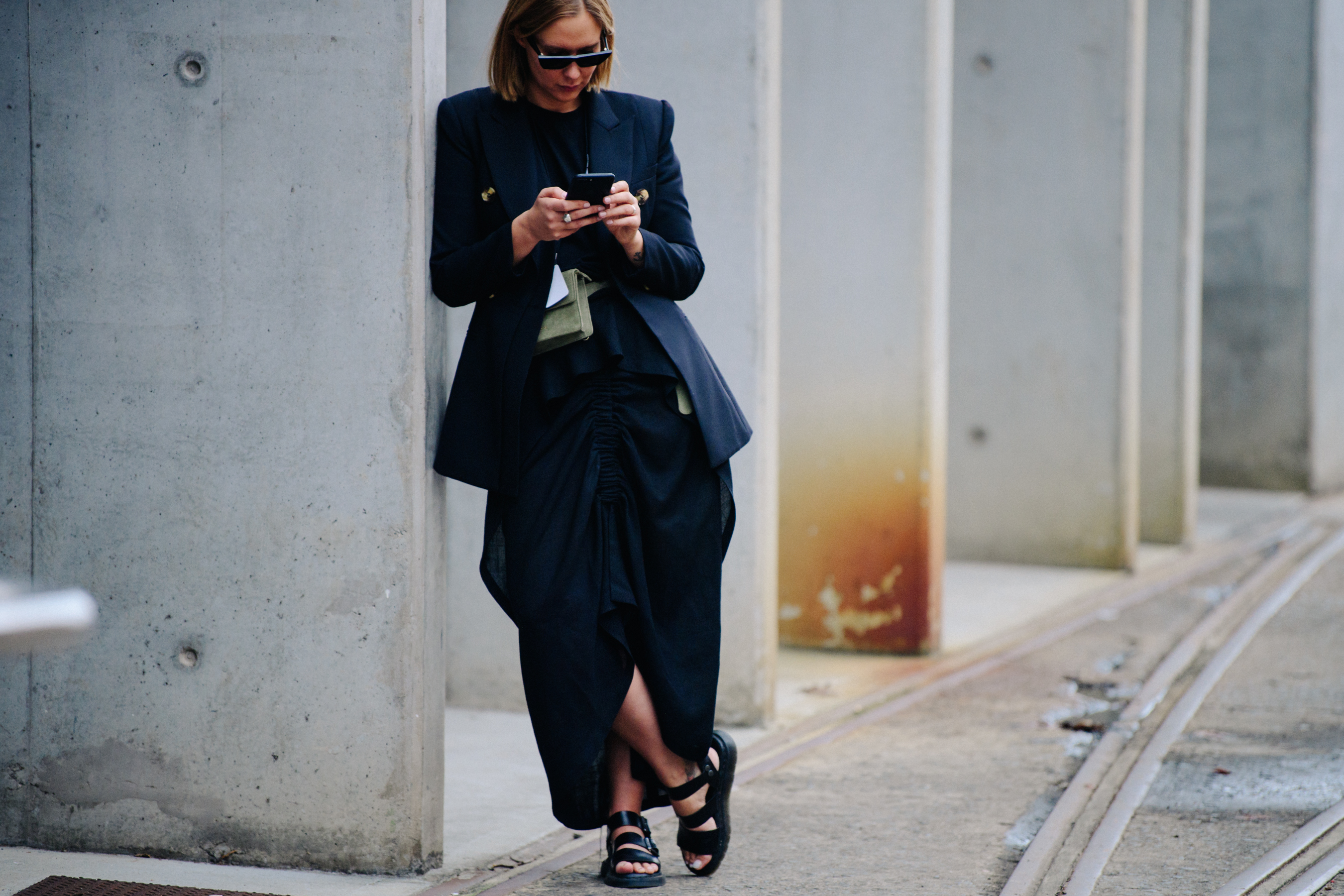 Woman wearing dark navy suit
