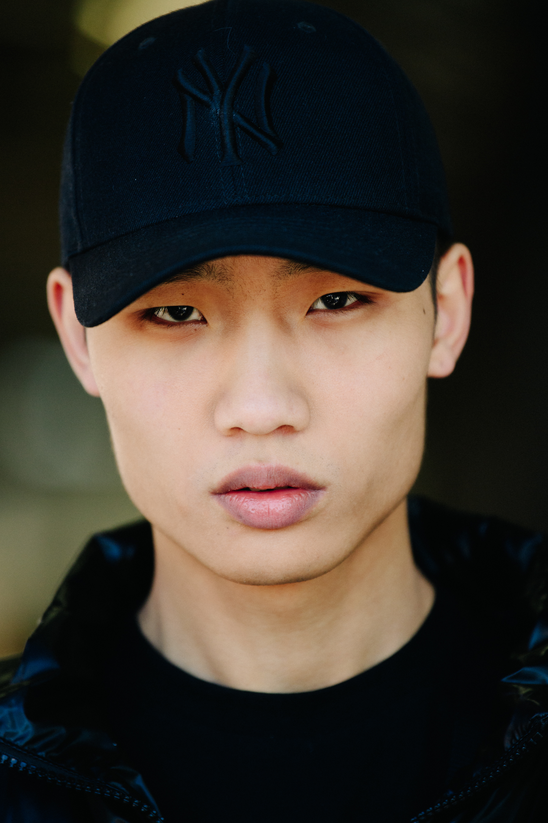 Portrait of Asian model wearing cap