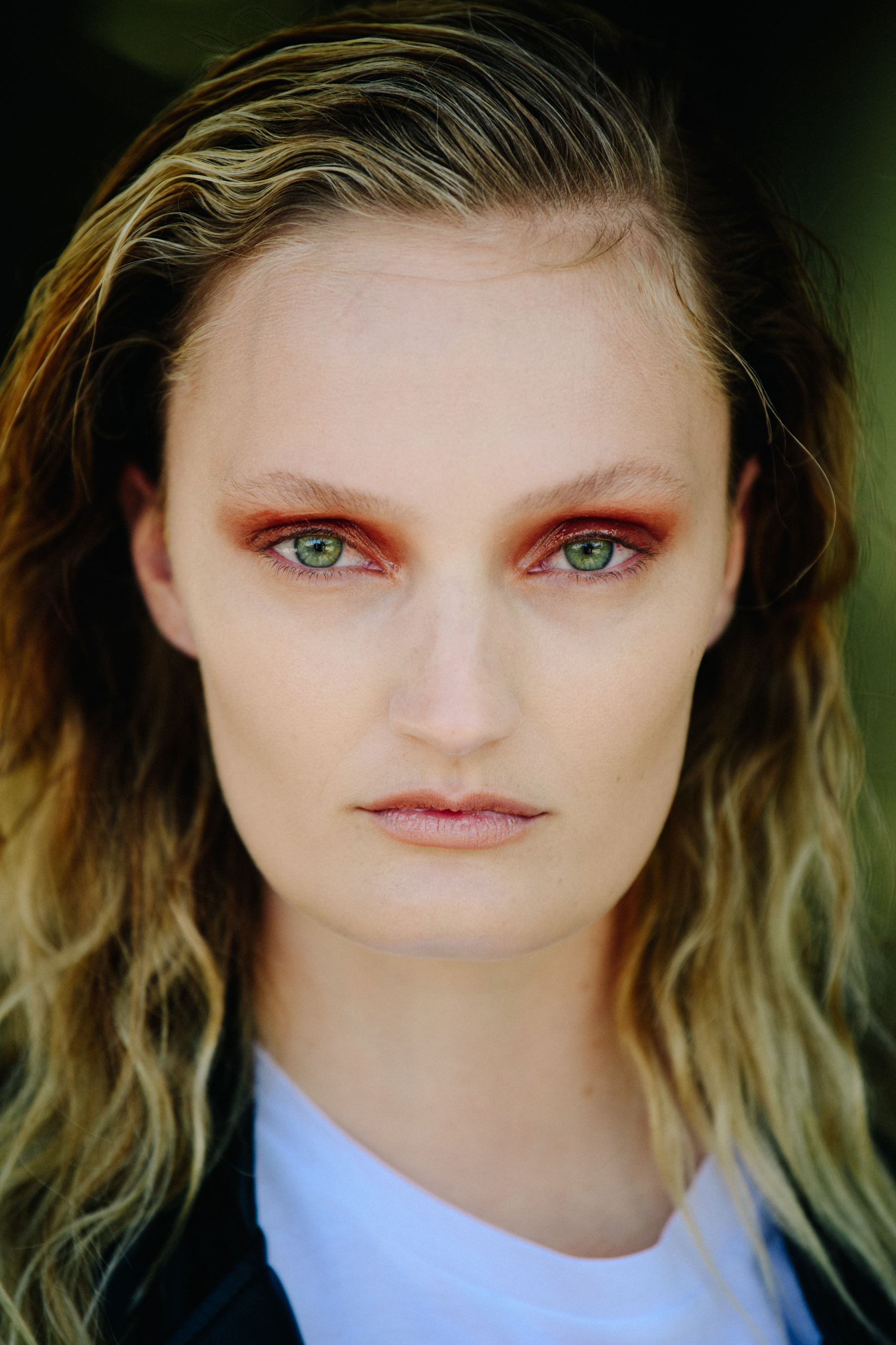 Portrait of model with curly blonde hair
