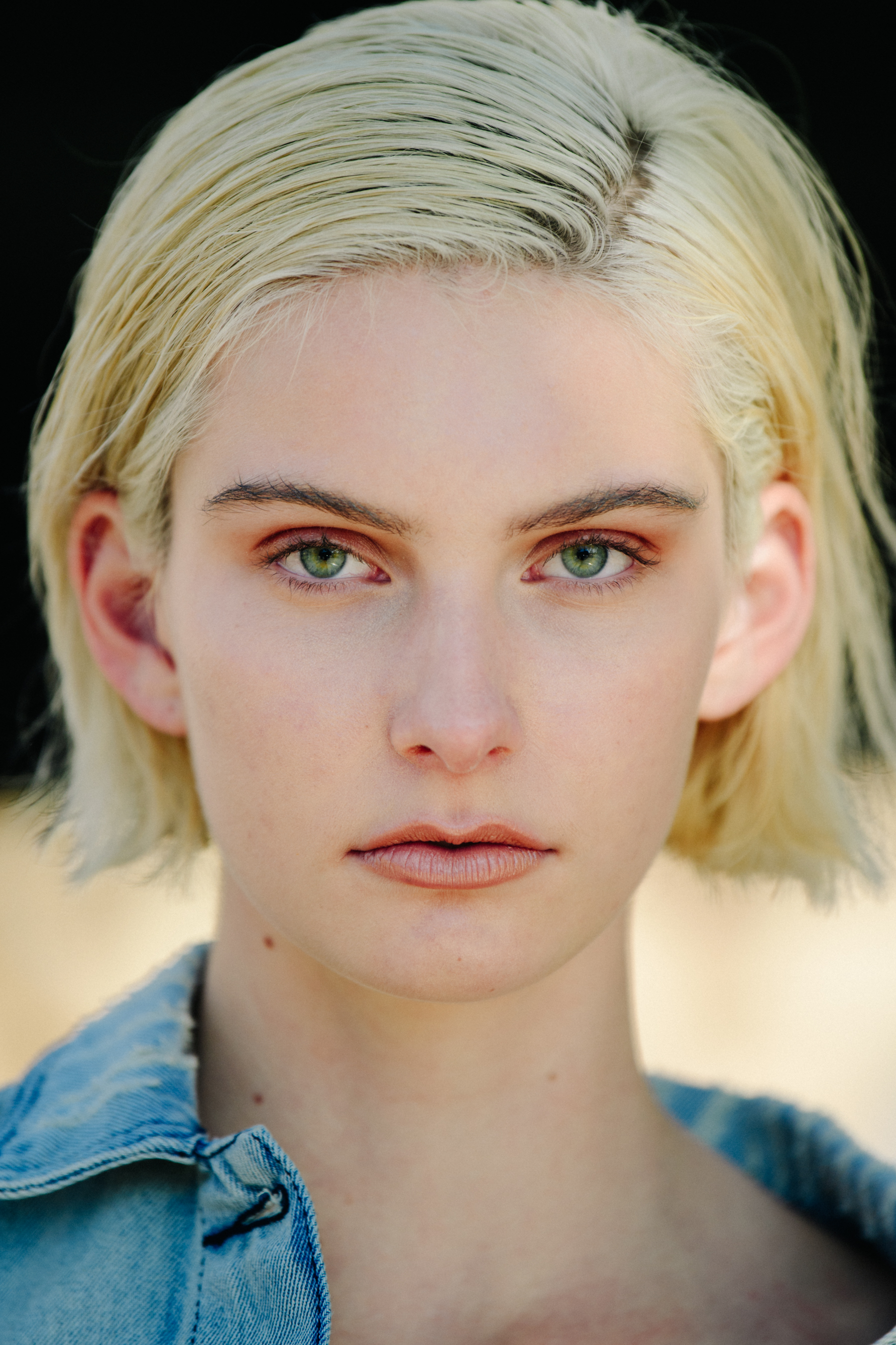 Portrait of model with cropped blonde hair