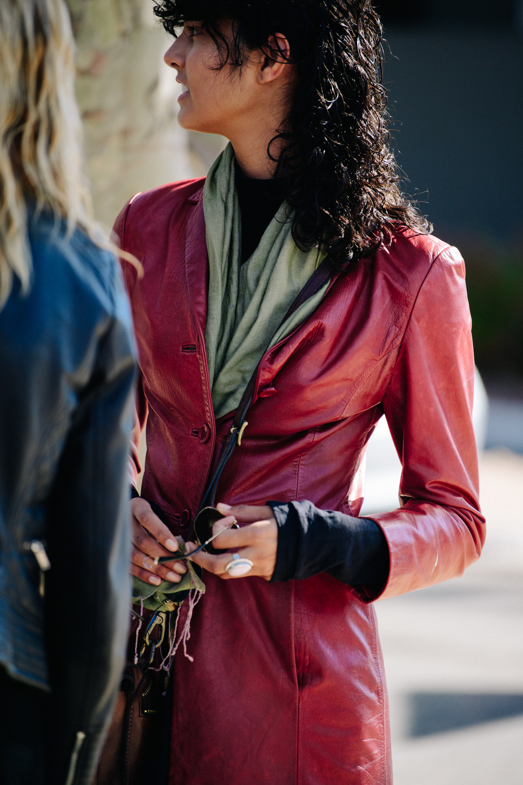 Woman wearing red leather coat